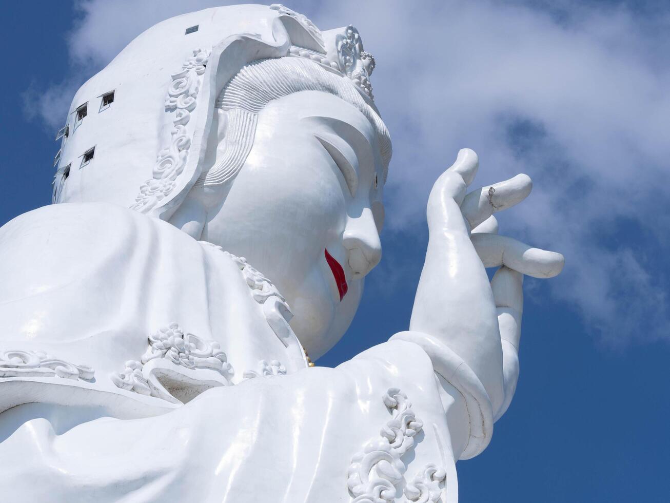 Guan Yin Buddha Statue Statue of buddha Bodhisattva GuanYin or Kuan Yin in a buddhist pagoda temple. photo