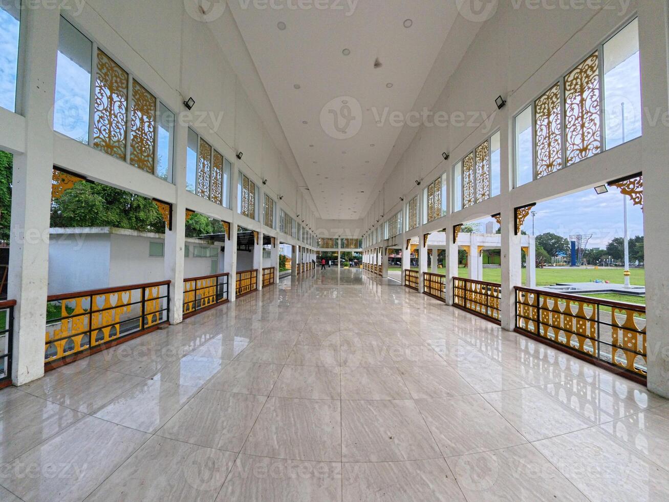 Great Hallway with Open Windows and Columns photo