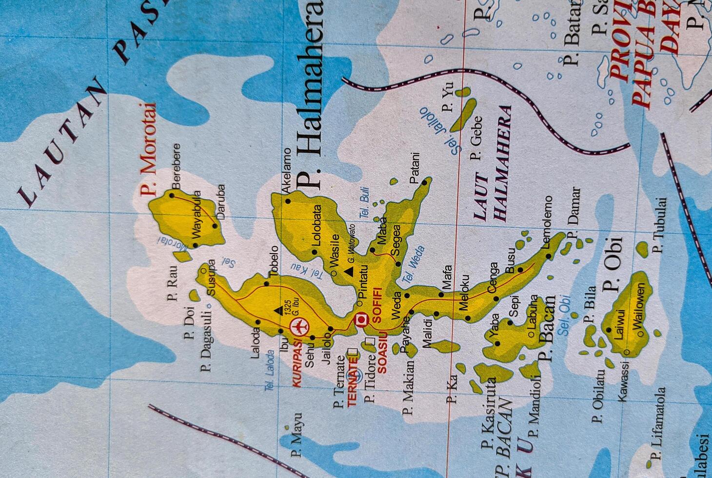 Halmahera island and Ternate city on map. photo