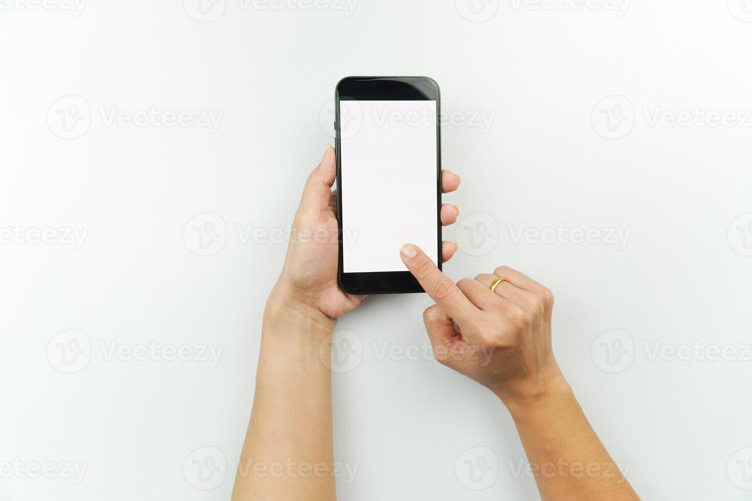 A person holding a smartphone with a blank screen photo