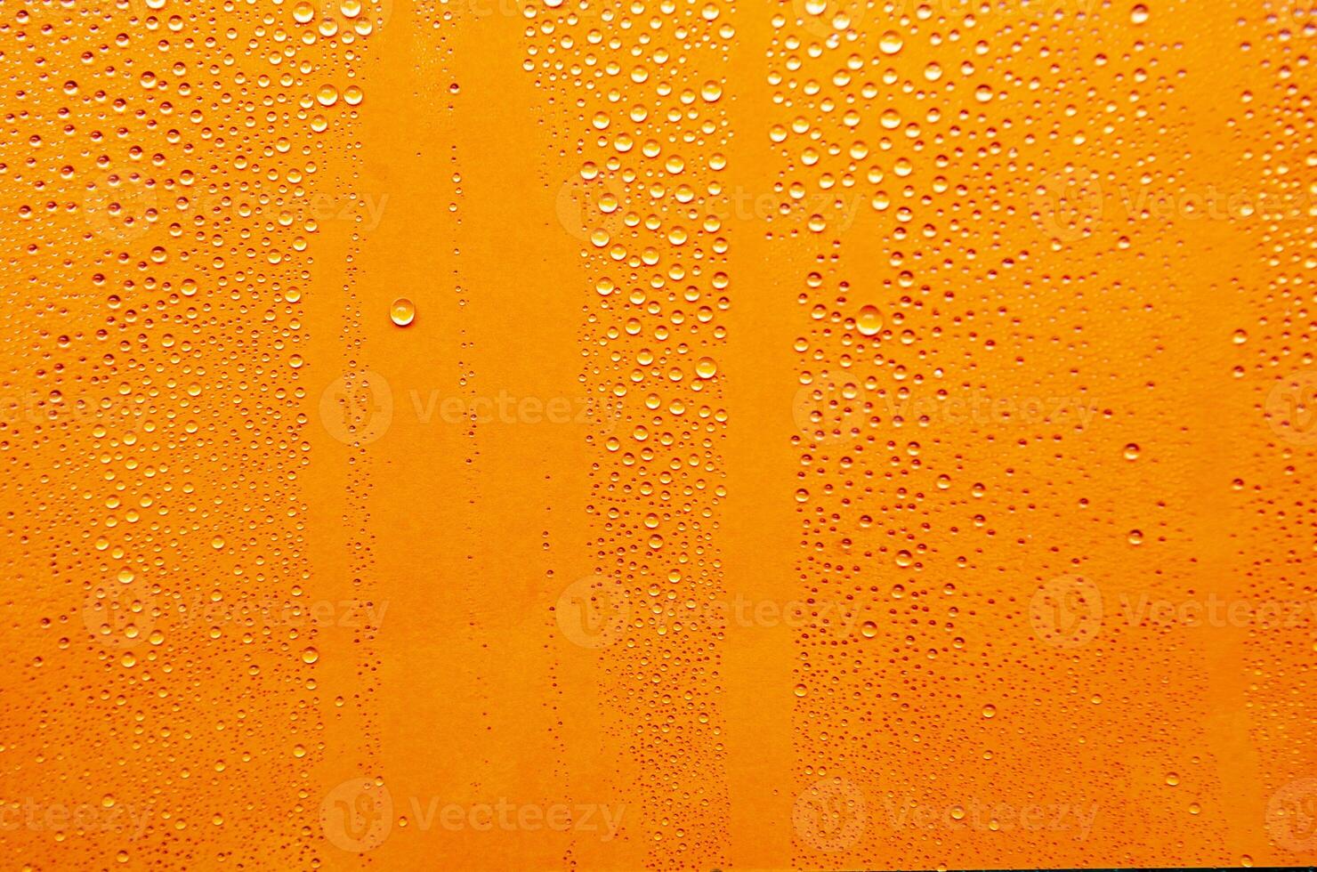 Clear water droplets with orange cover background photo