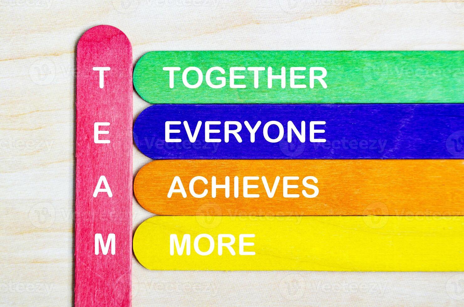 TEAM representing Together Everyone Achieves More text on wooden stick photo