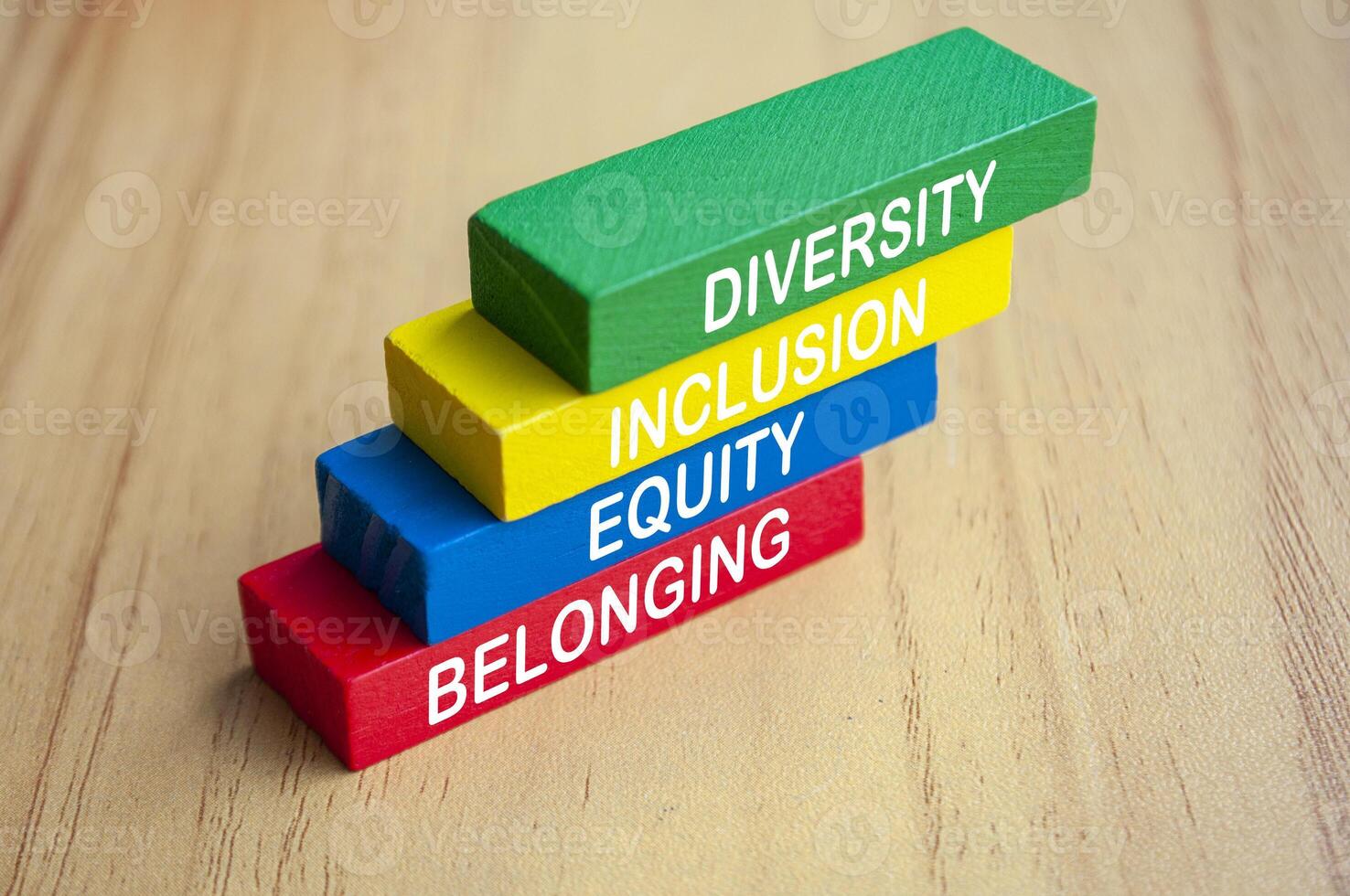Diversity, Inclusion, Equity and Belonging text on multicolored wooden blocks. D and I concept photo