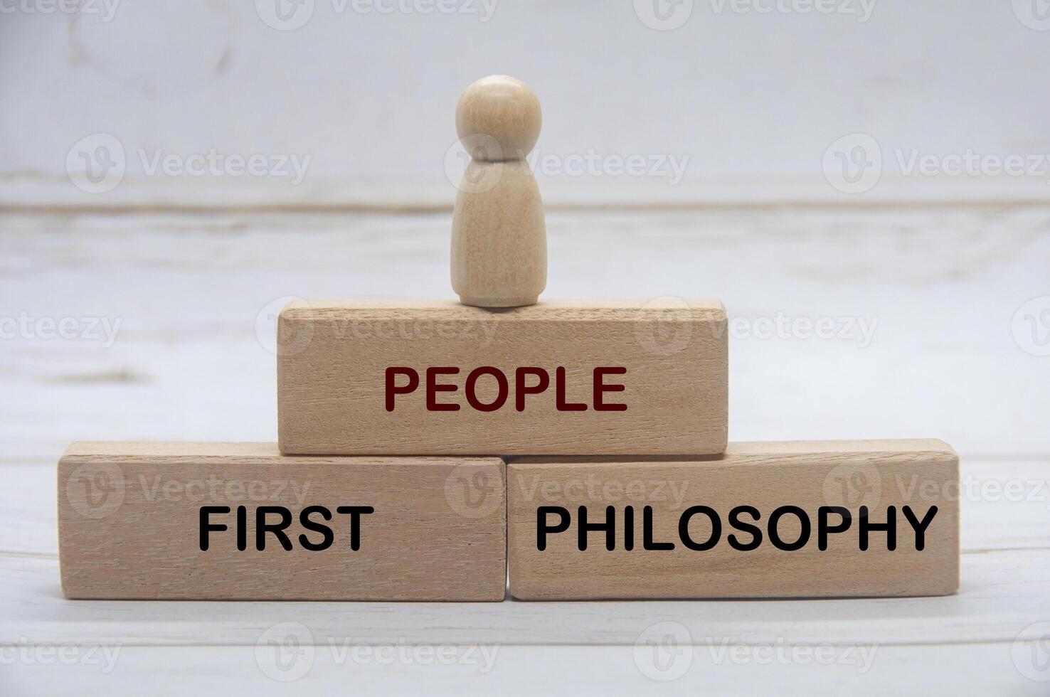 People First Philosophy text on wooden blocks. People first concept photo