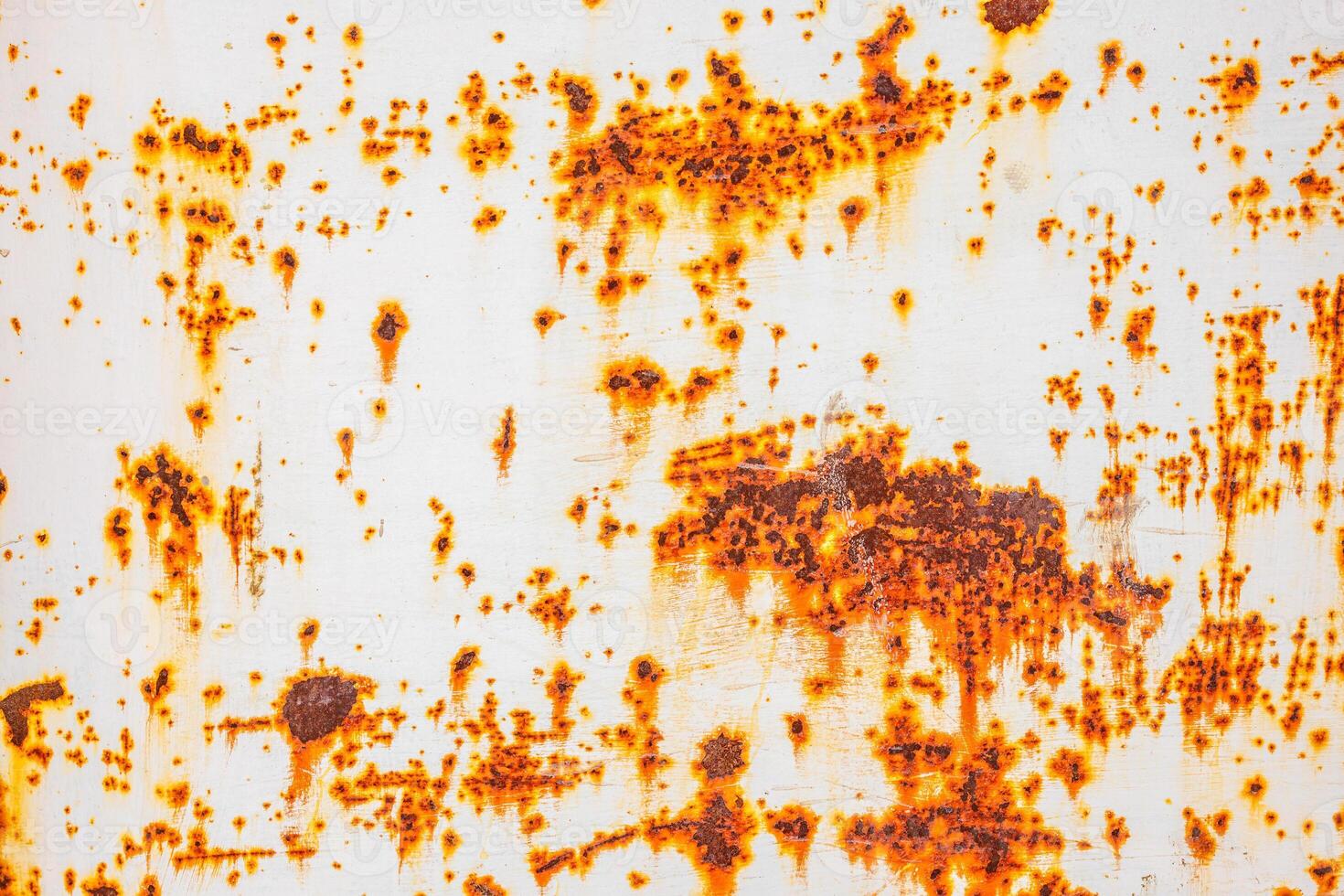 rusty flat sheet steel with peeling white paint photo