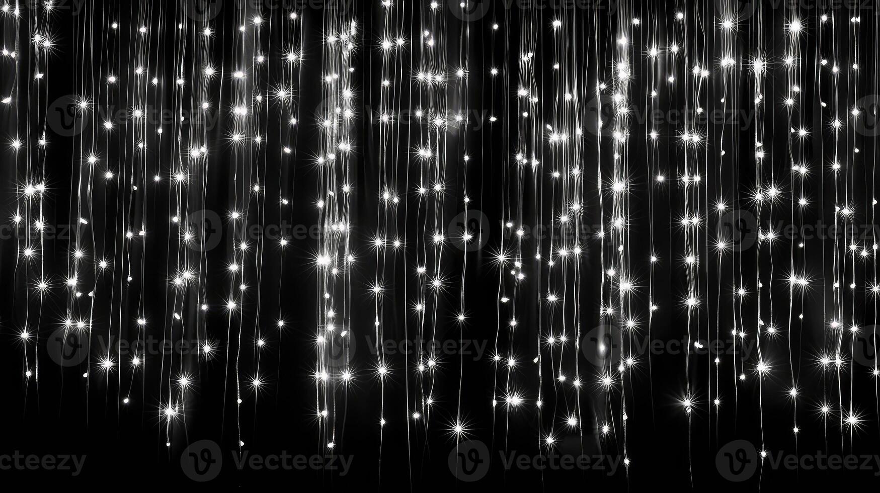 ctrast white string lights on black background photo