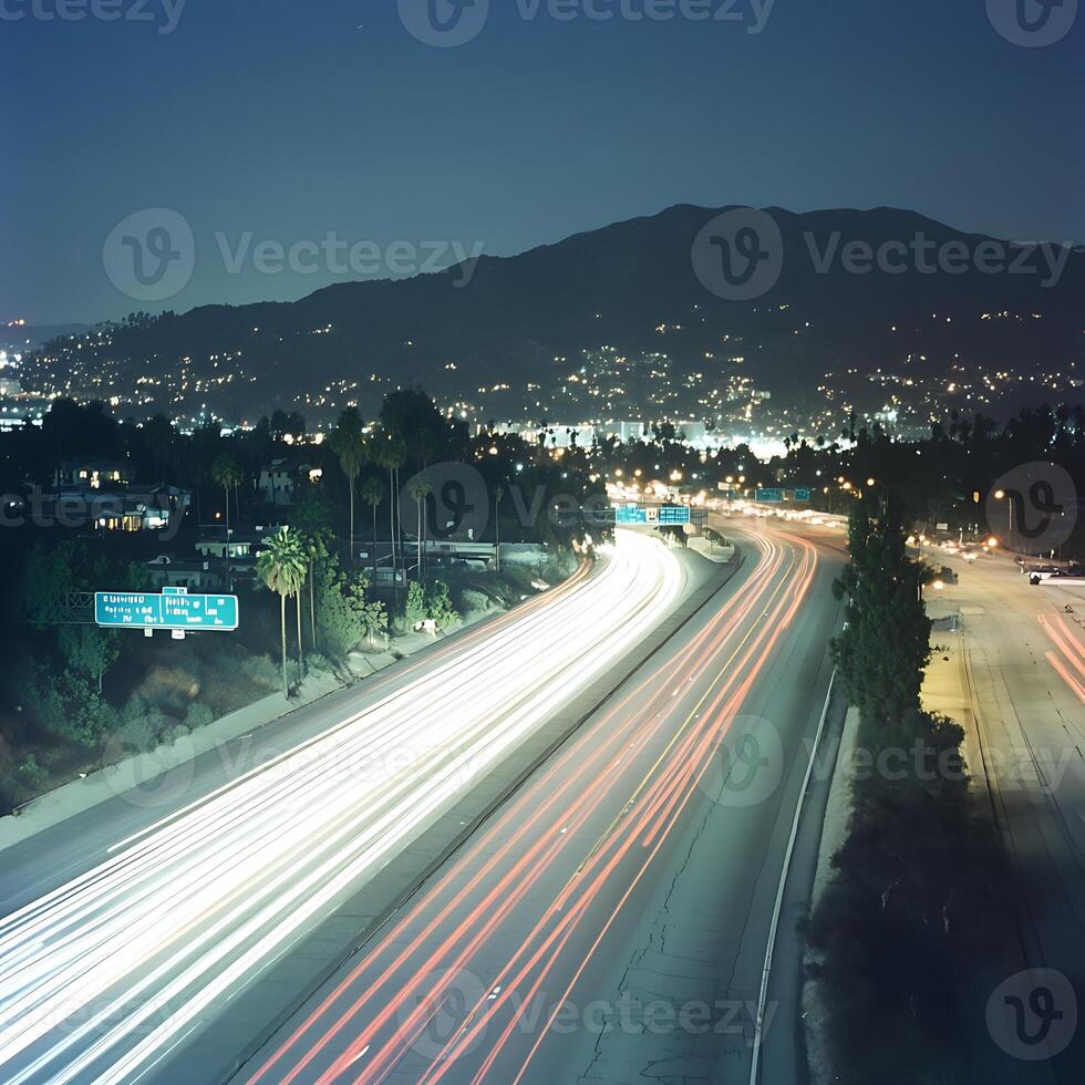 A highway with cars driving on it photo