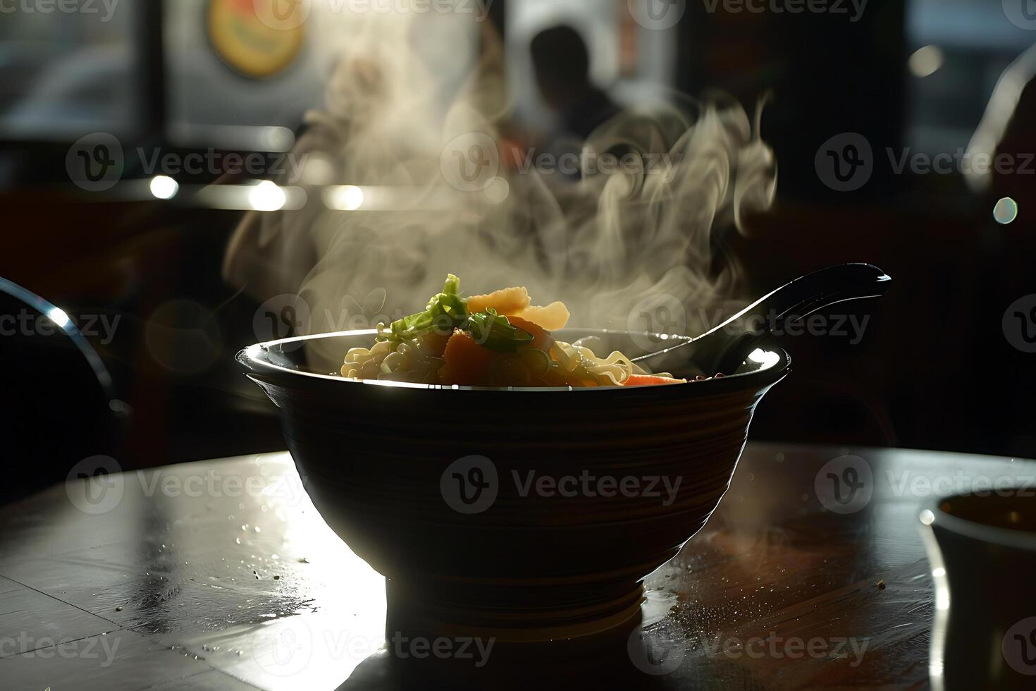 A bowl of soup on a table photo