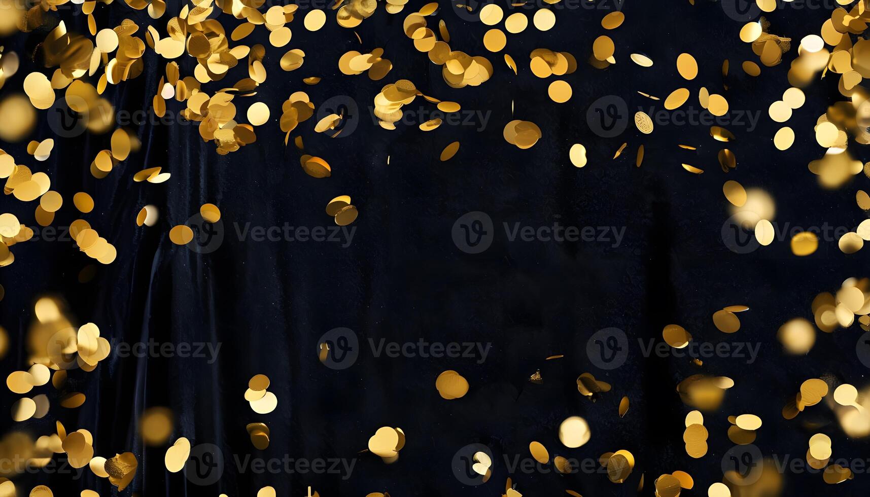 Golden confetti falling on a black background photo