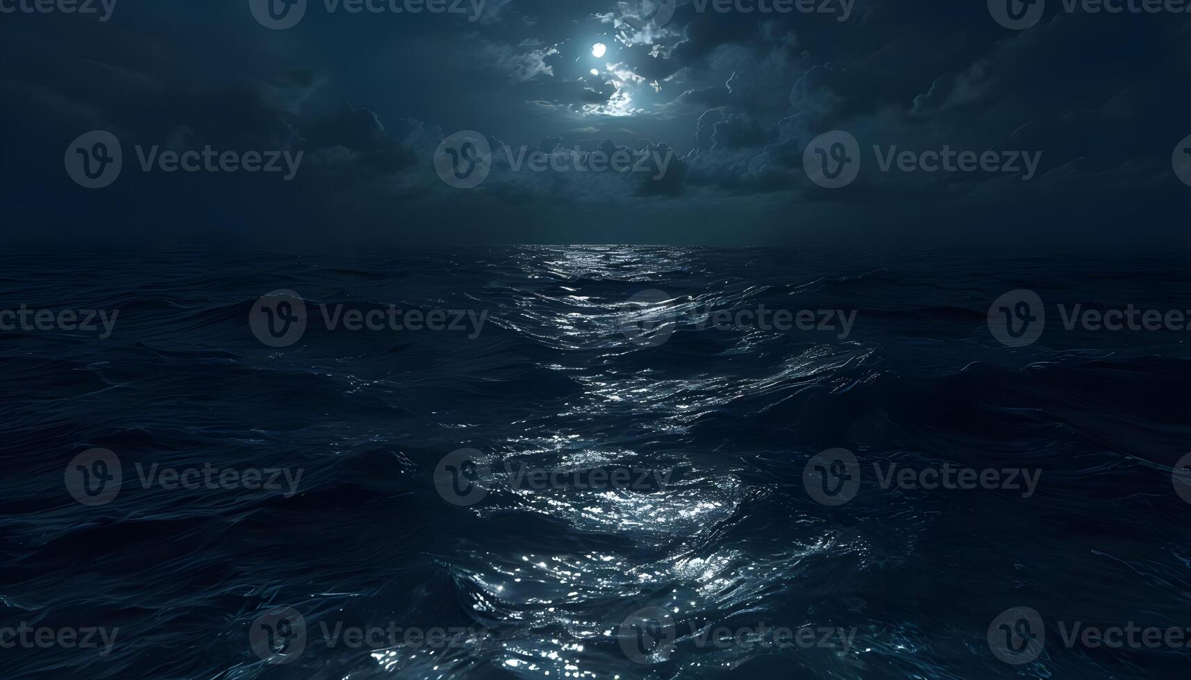 A dark ocean with a full moon shining over it photo