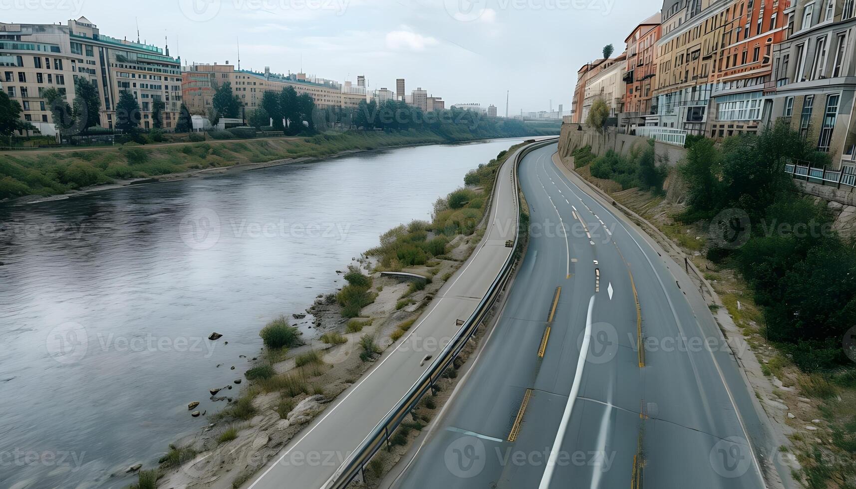 A view of a highway with a river running through it photo