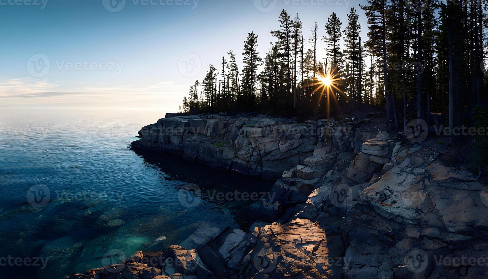 A rocky cliff with trees and water photo