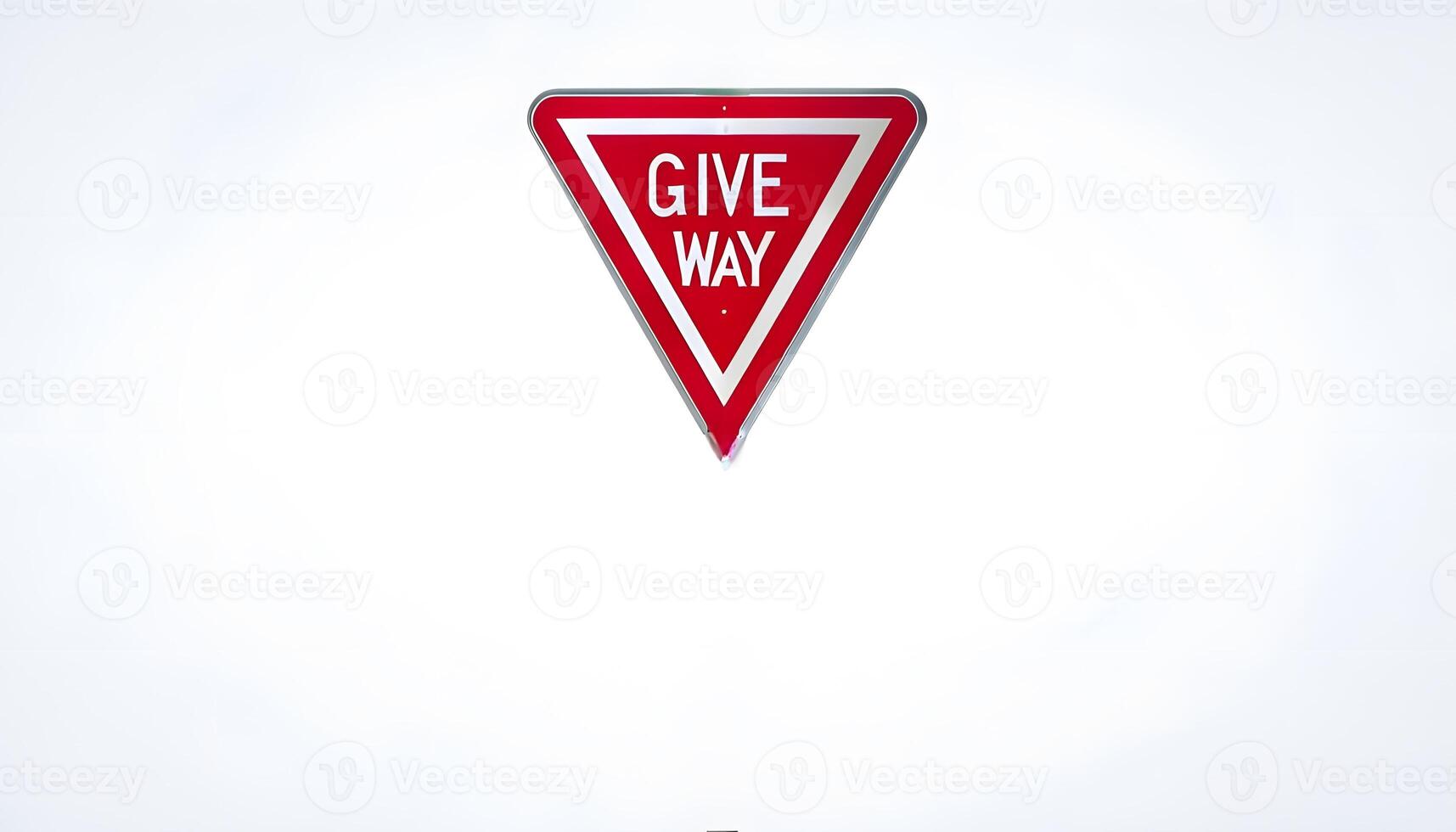A red and white give way sign on a white background photo