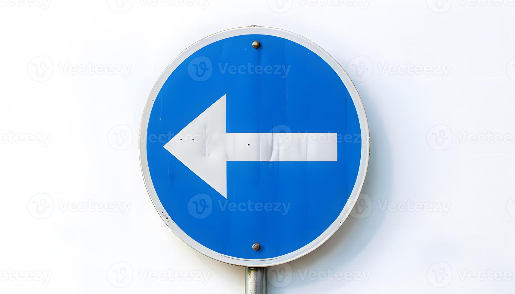 A blue and white sign with an arrow pointing in the direction of the right photo