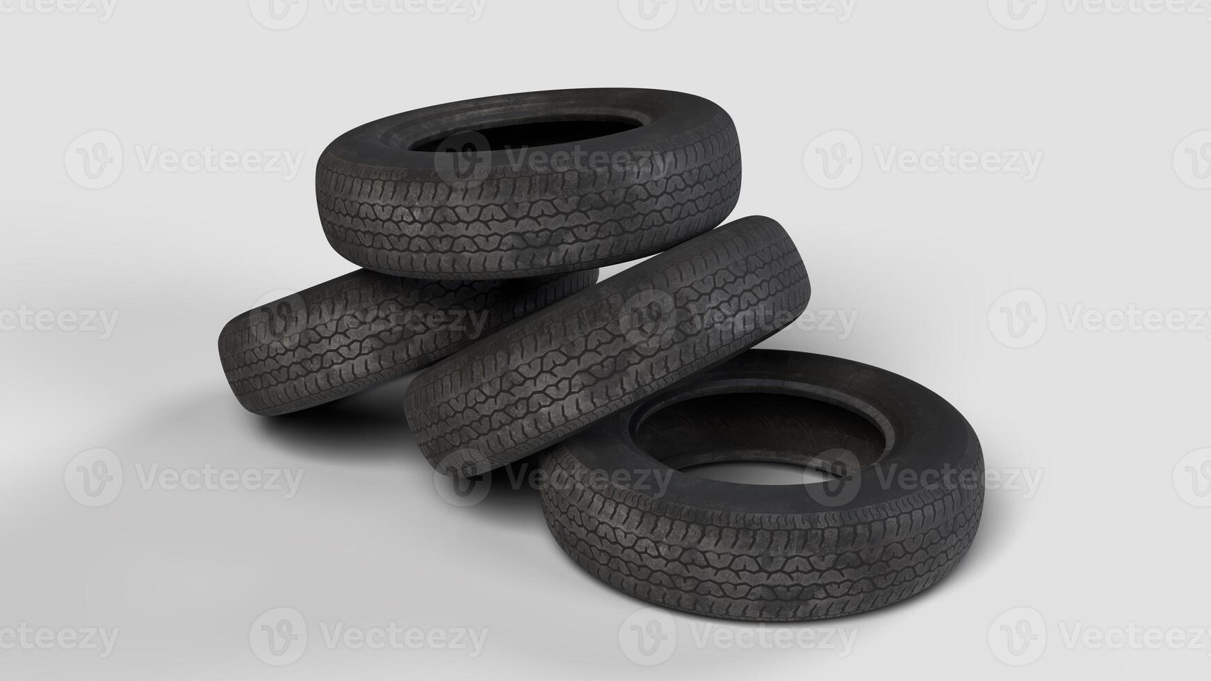 four old tires on a white background, side view photo