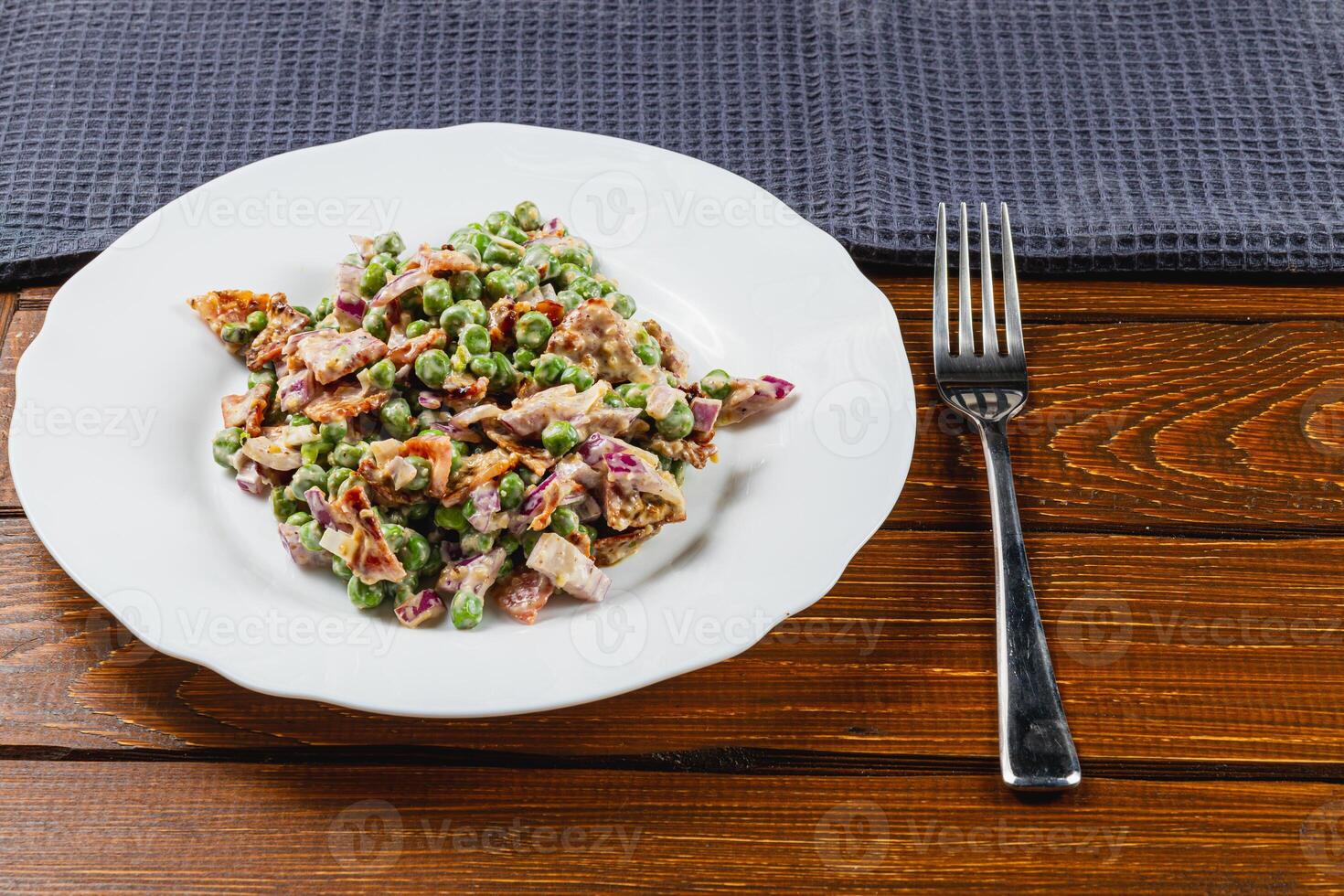 Fresh green pea salad with scallions and purple onion. on whole grain bread photo