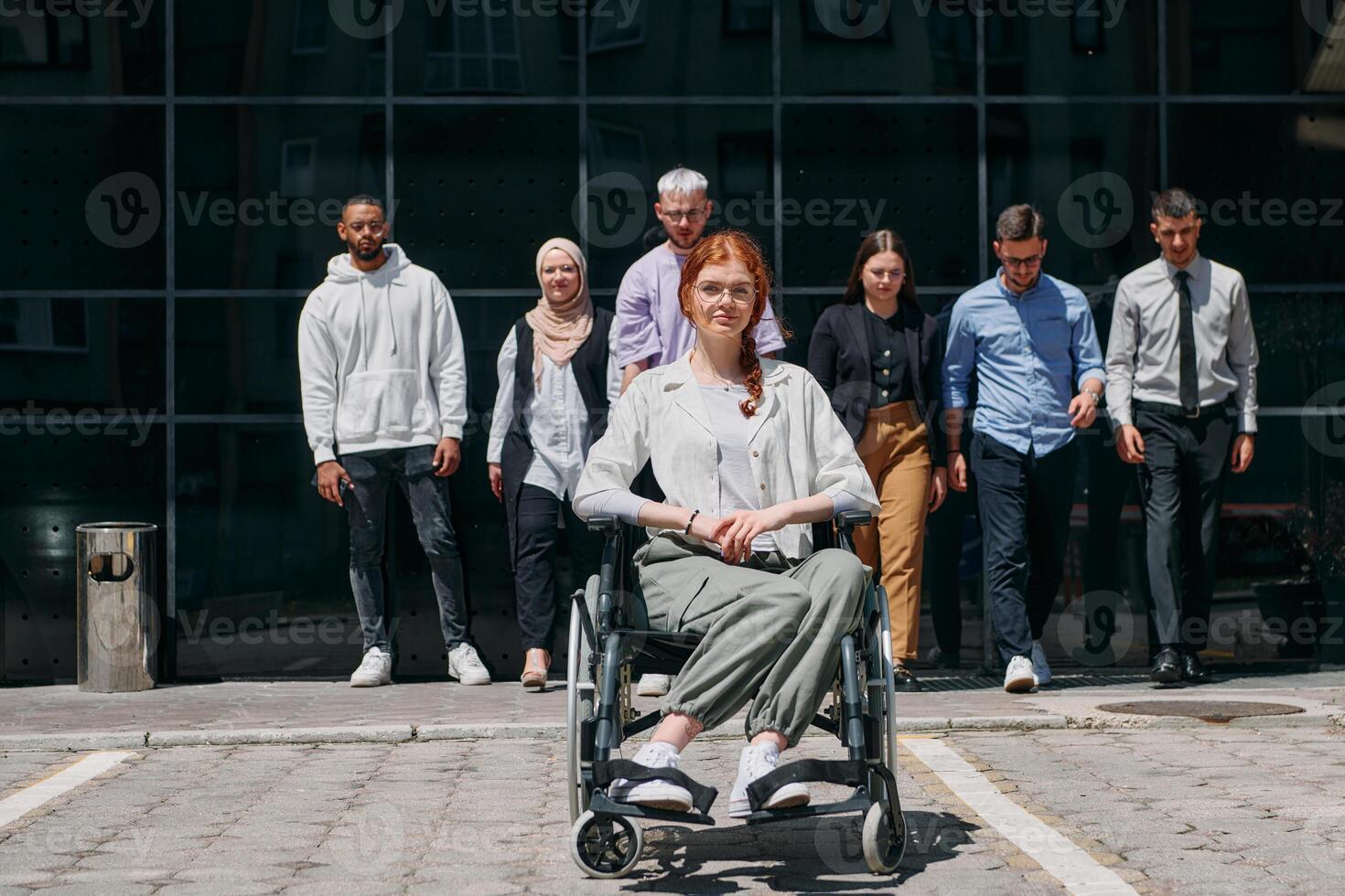 A diverse and confident group of businessmen posing together, with a businesswoman in a wheelchair radiating success, ambition, and unity, capturing the essence of a dynamic and inspiring business photo