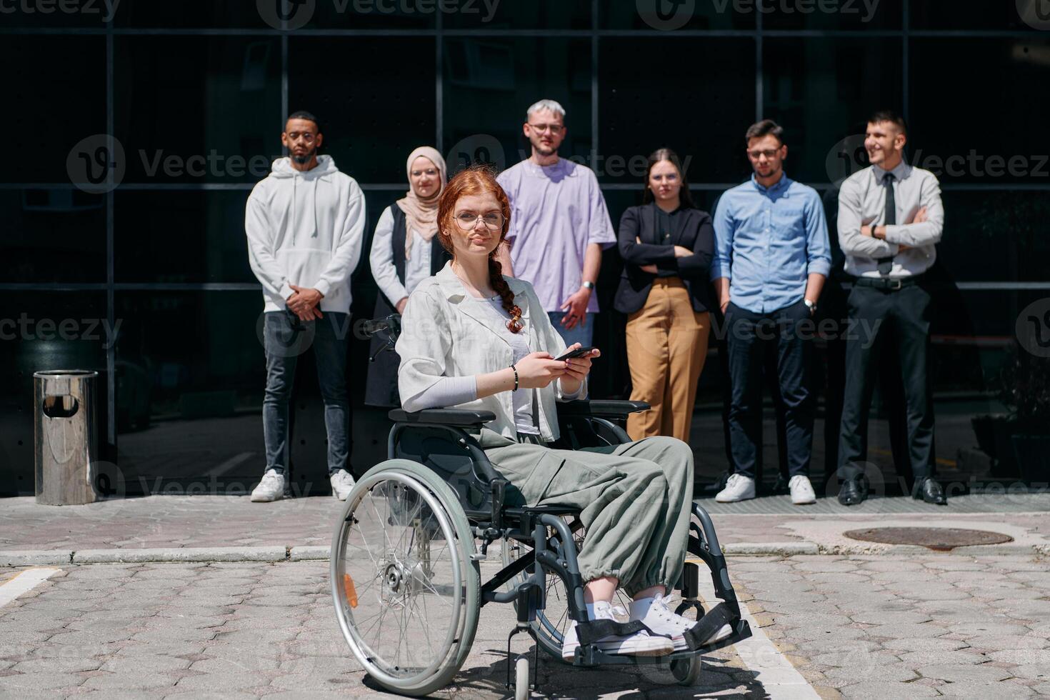 A diverse and confident group of businessmen posing together, with a businesswoman in a wheelchair radiating success, ambition, and unity, capturing the essence of a dynamic and inspiring business photo