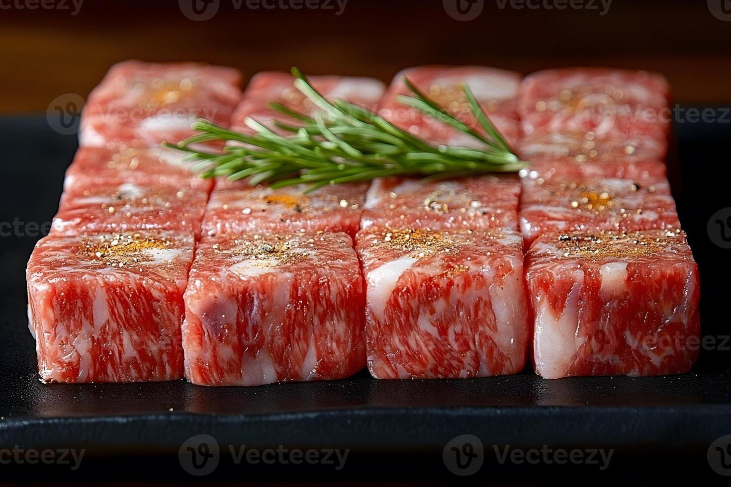 Premium Cut Wagyu Beef with Rosemary Garnish for Culinary Delights and Food Photography photo