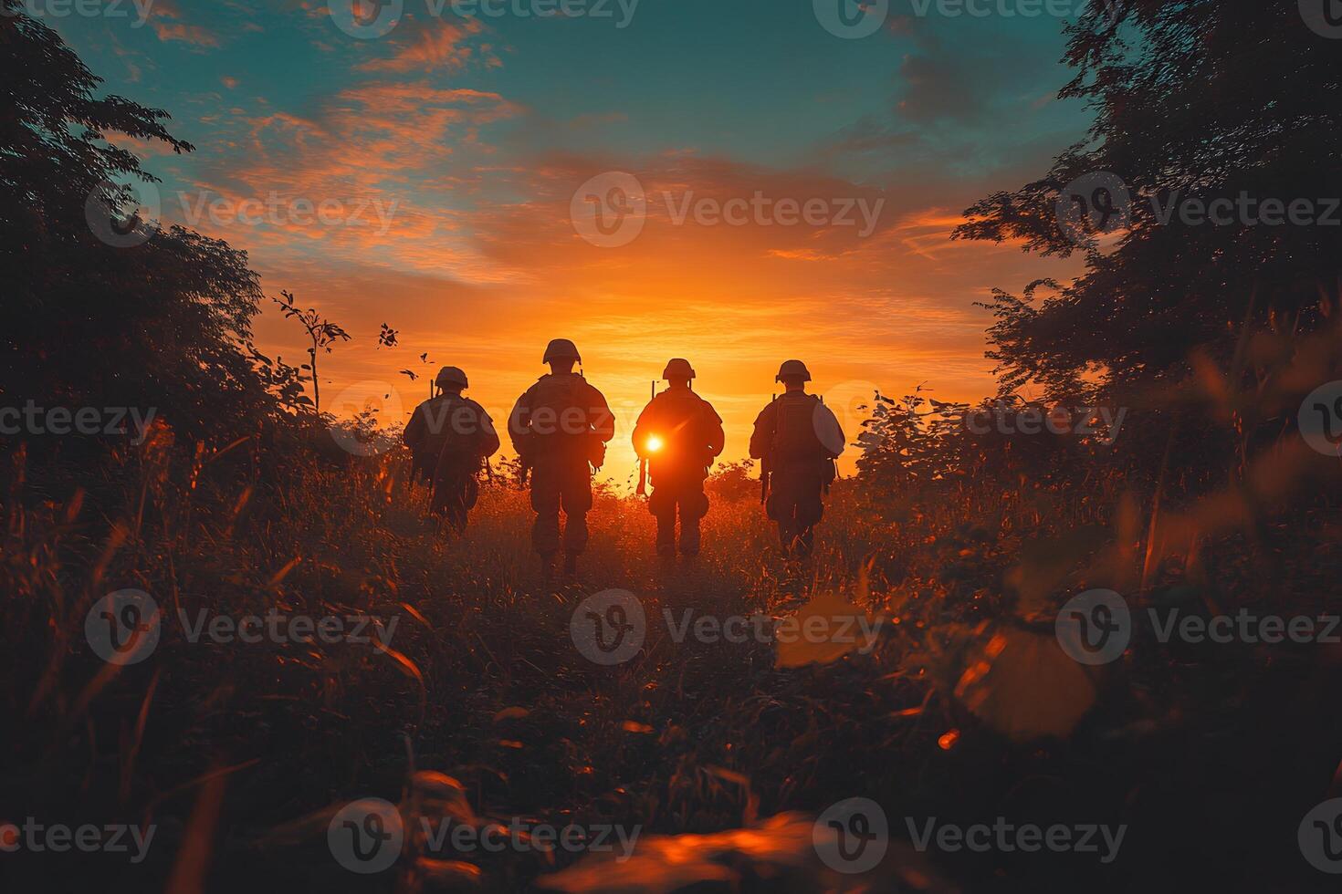Military Soldiers Walking at Sunrise in Scenic Outdoor Landscape photo