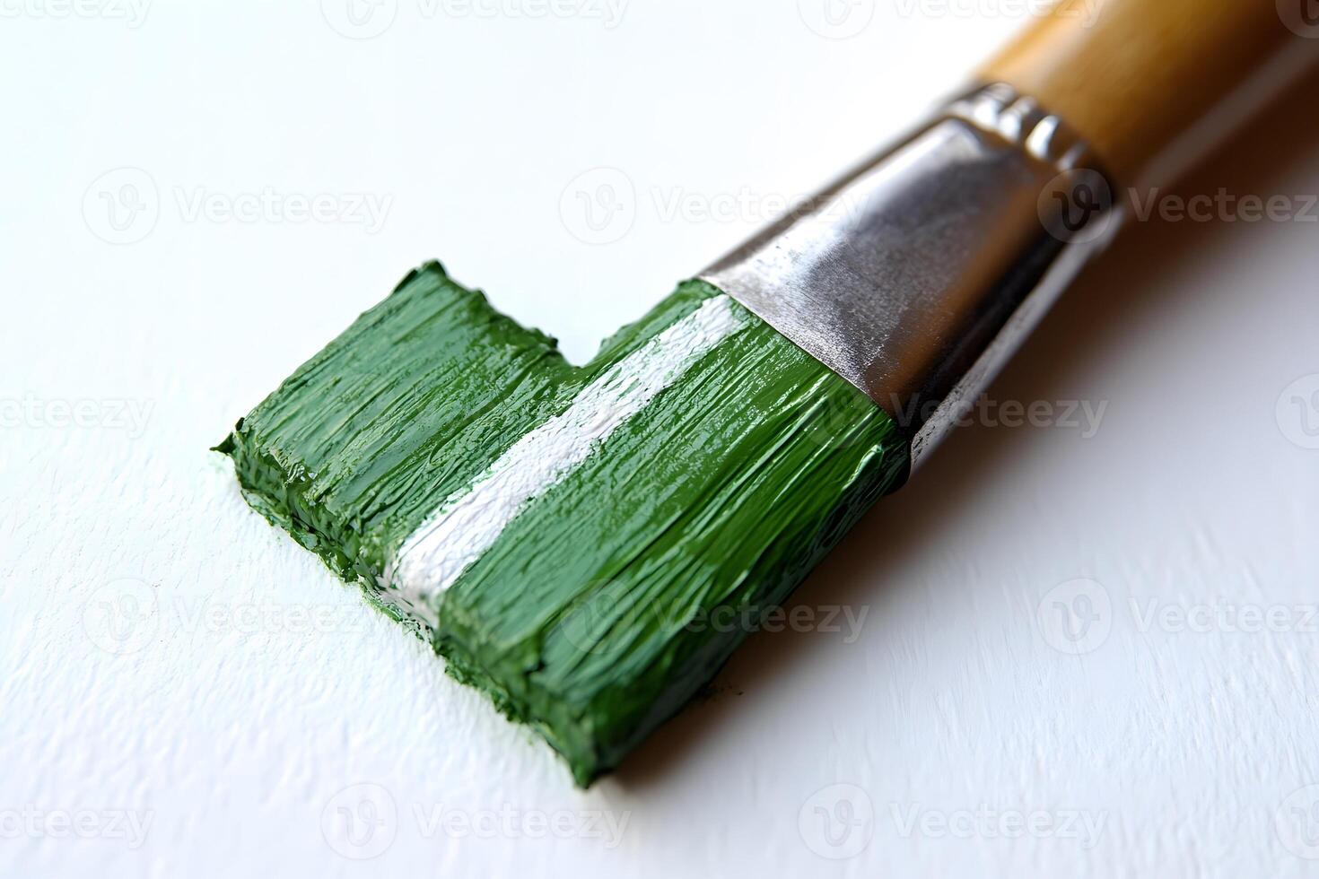Green Paintbrush Stroke on White Background for Creative Design and Art Projects photo