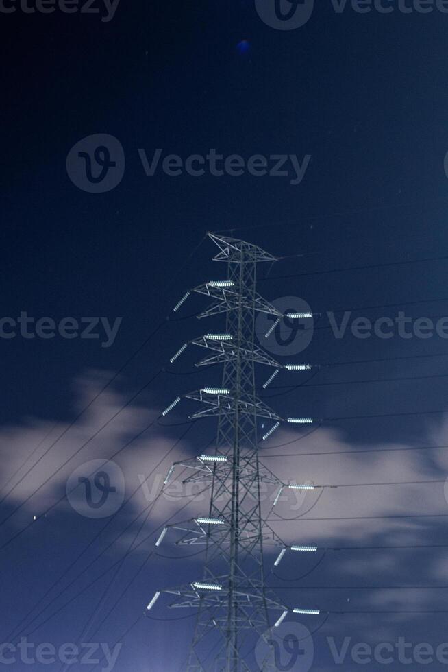 high voltage post.High voltage post.High-voltage tower sky background. photo