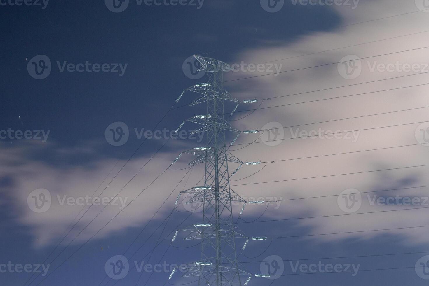 High voltage post. High-voltage tower sky background. Electricity distribution station. photo