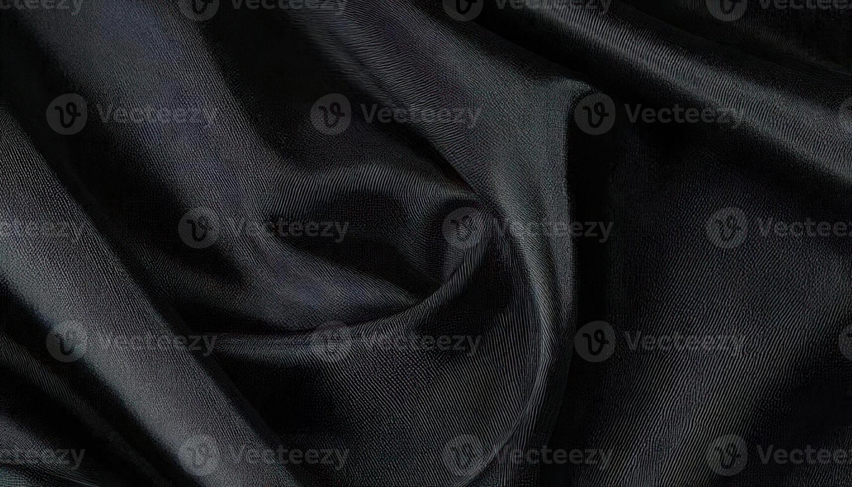 A black satin fabric with a dark color photo