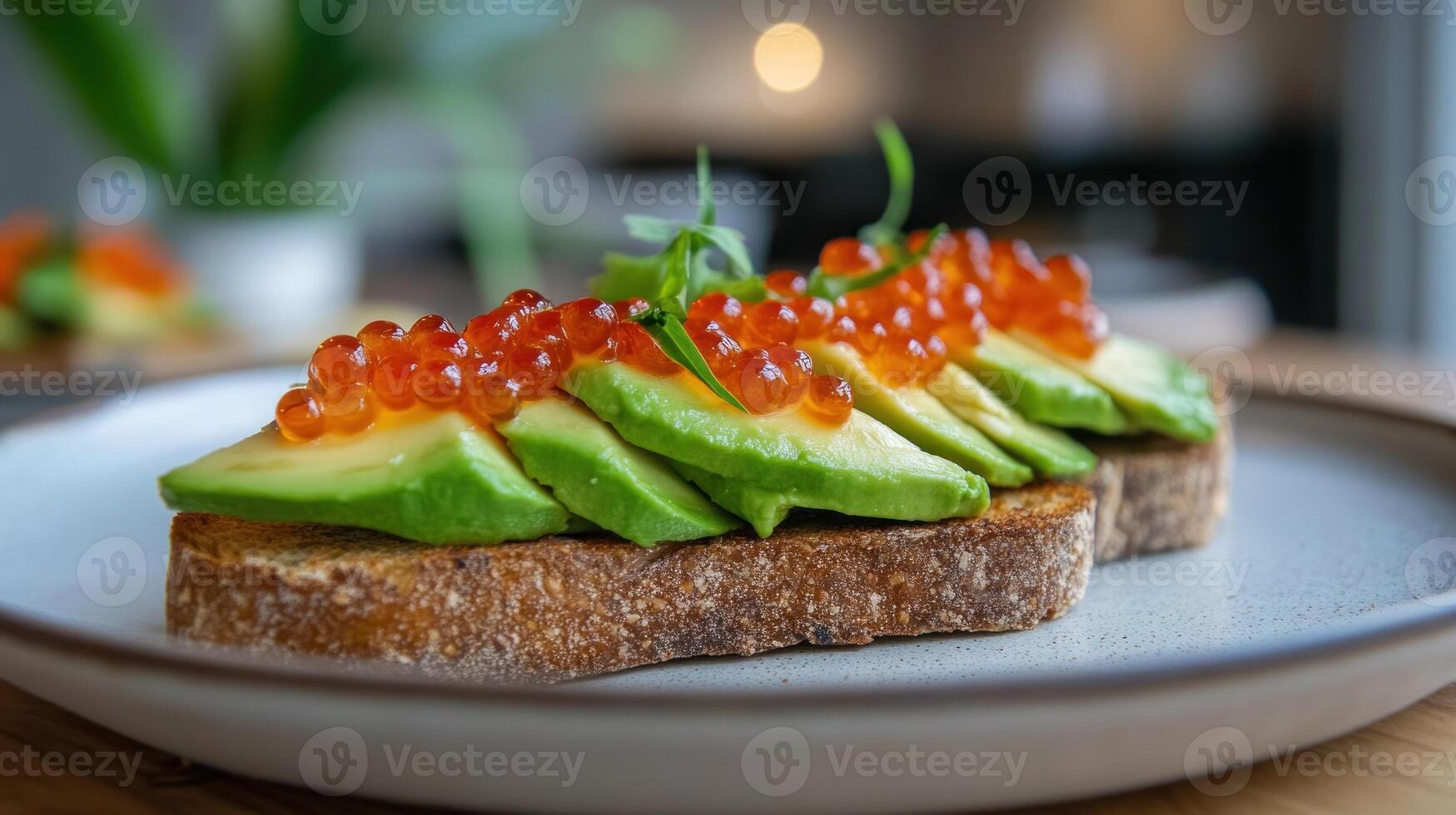 Gourmet avocado toast with caviar on artisan bread for breakfast and brunch photo
