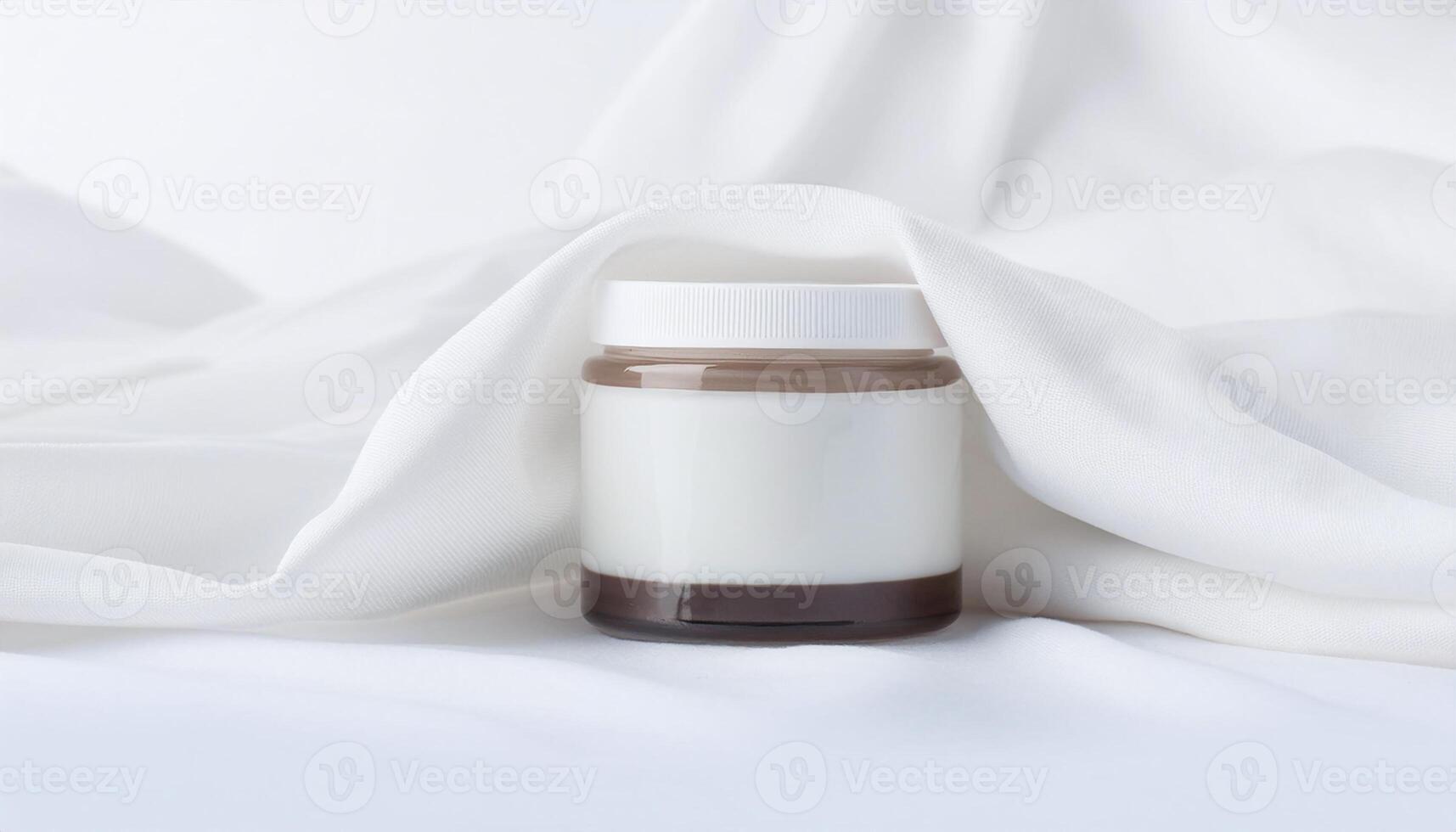 Cosmetic Bottle on White Cloth Background photo