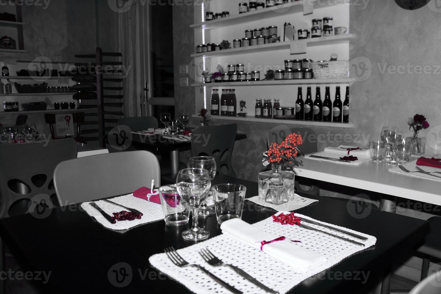 A black and white photo of a restaurant table