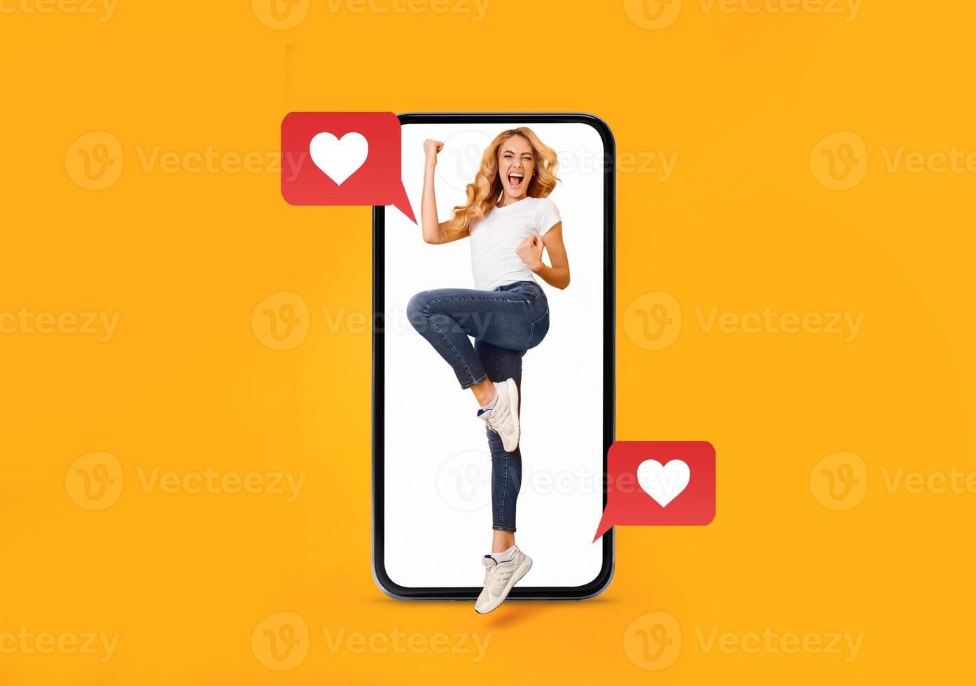A young woman joyfully expresses excitement while interacting with a smartphone. The bright background and heart icons symbolize love and modern communication in dating. photo