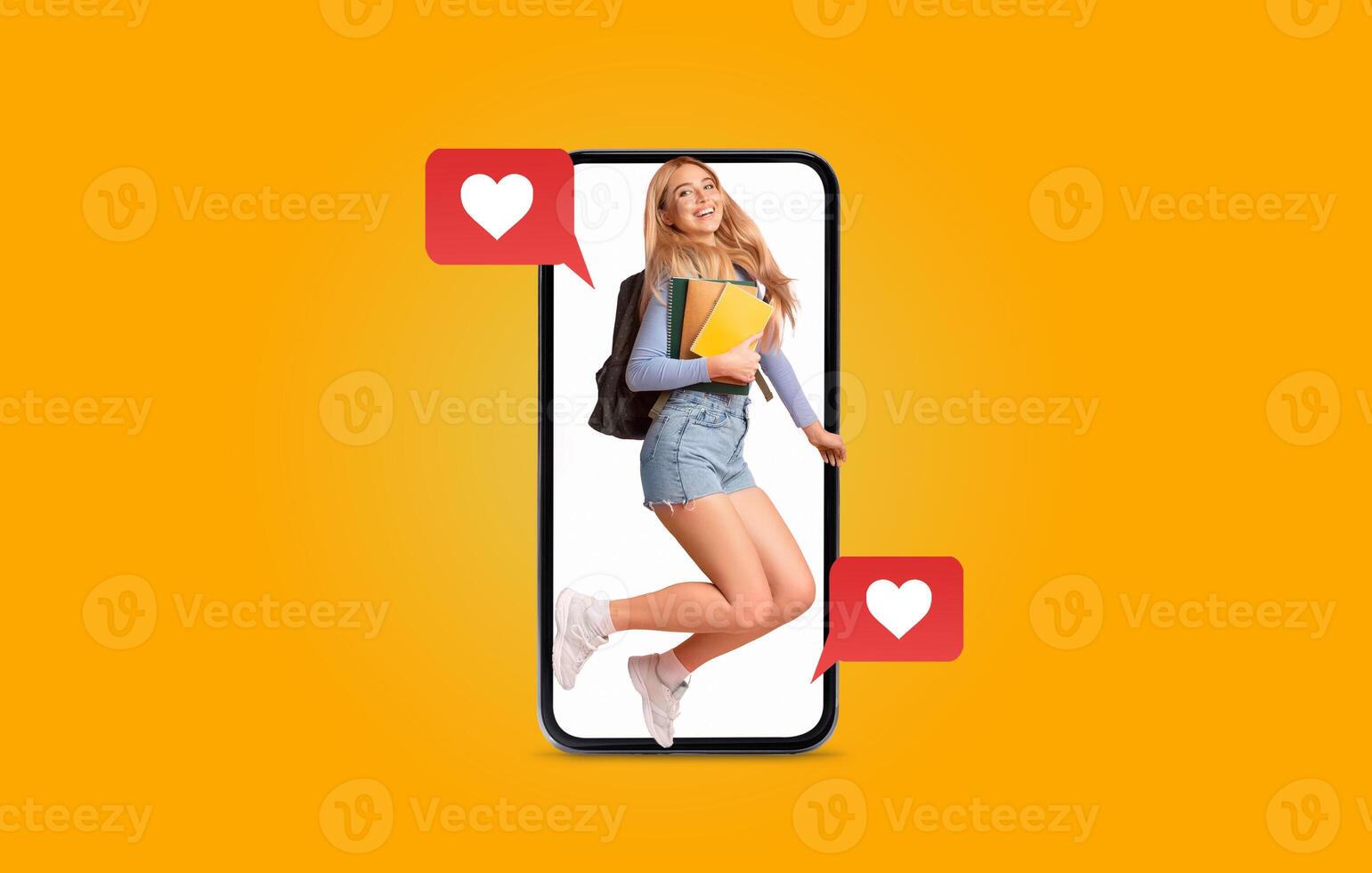 A young woman with a backpack jumps joyfully inside a smartphone frame. She holds folders while interacting with social media messages, expressing excitement and love during the Valentine's season. photo