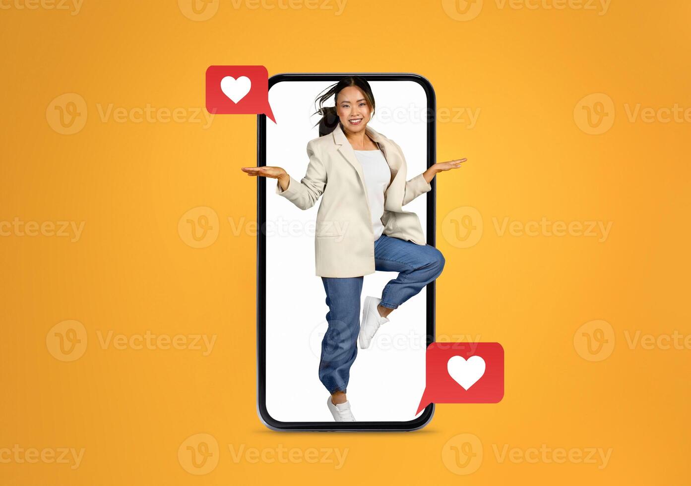 A person joyfully interacts with a smartphone, embodying the excitement of social media communication about love and connections in the digital age. The bright background adds to the uplifting vibe. photo