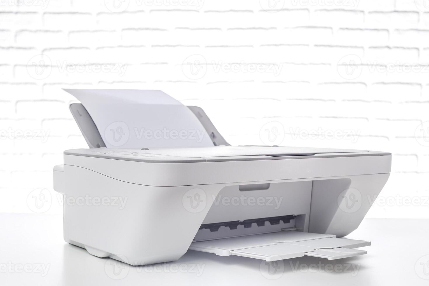 Modern multifunction printer on a clean white background ready for scanning, copying, and printing documents seamlessly photo