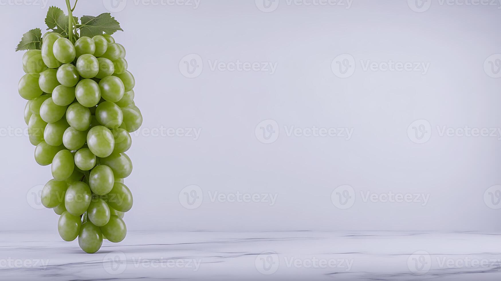 A bunch of fresh green grapes hanging against a minimalist white background, ideal for healthy eating concepts photo