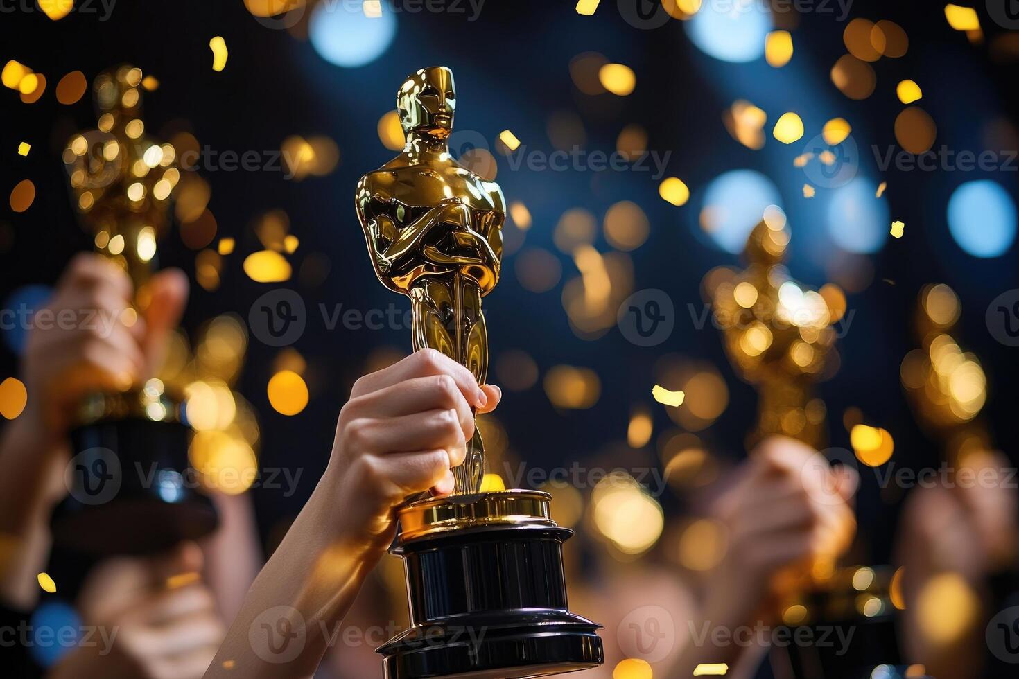 Celebrating achievement with golden statuette awards photo