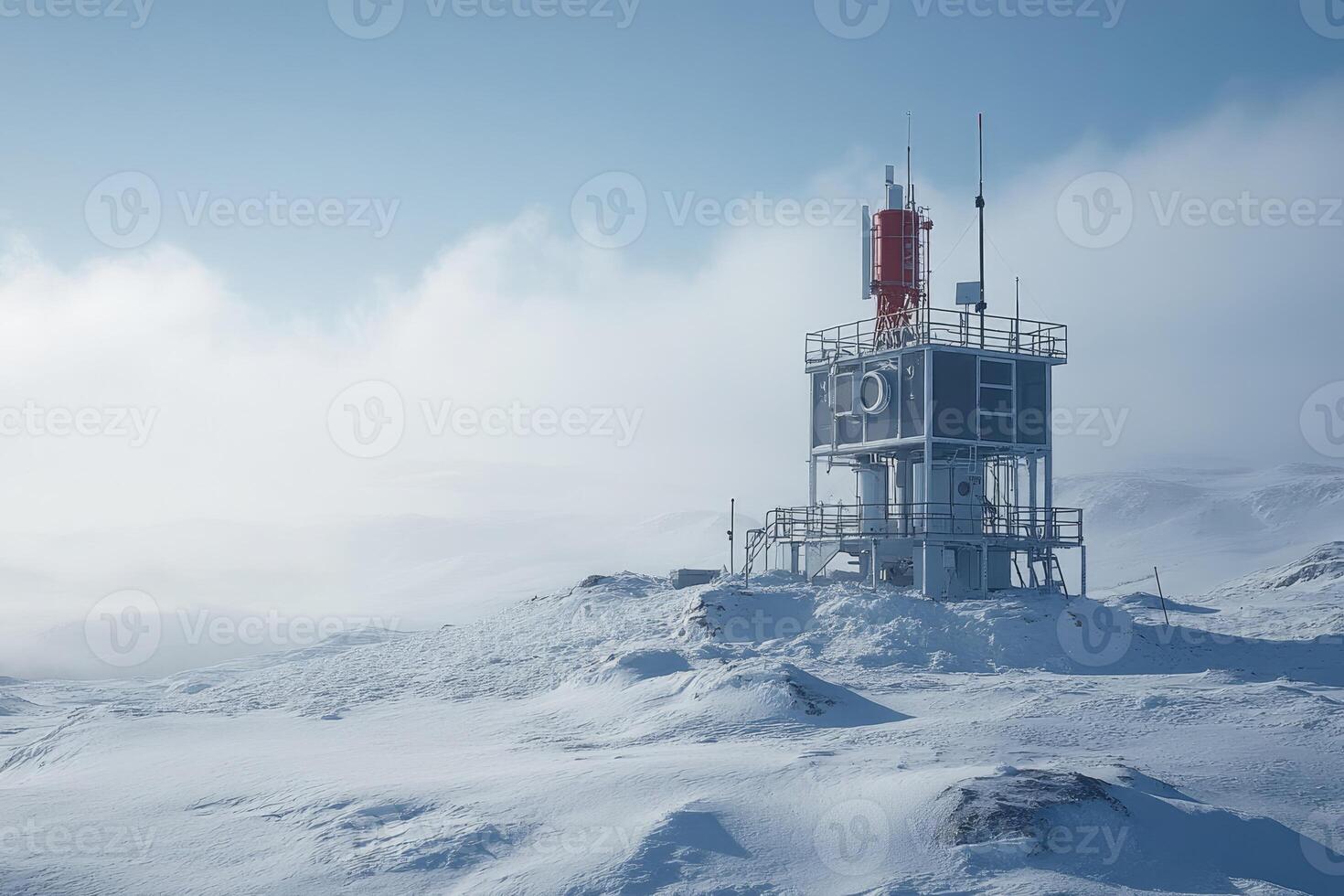 Telecommunication station surviving harsh winter conditions in snowy landscape photo