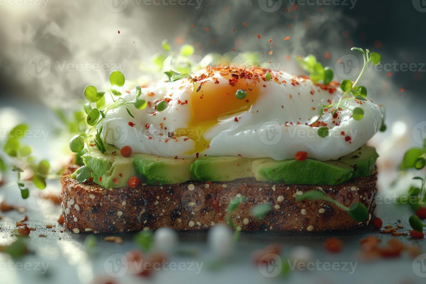 Delicious avocado toast with poached eggs and microgreens. photo