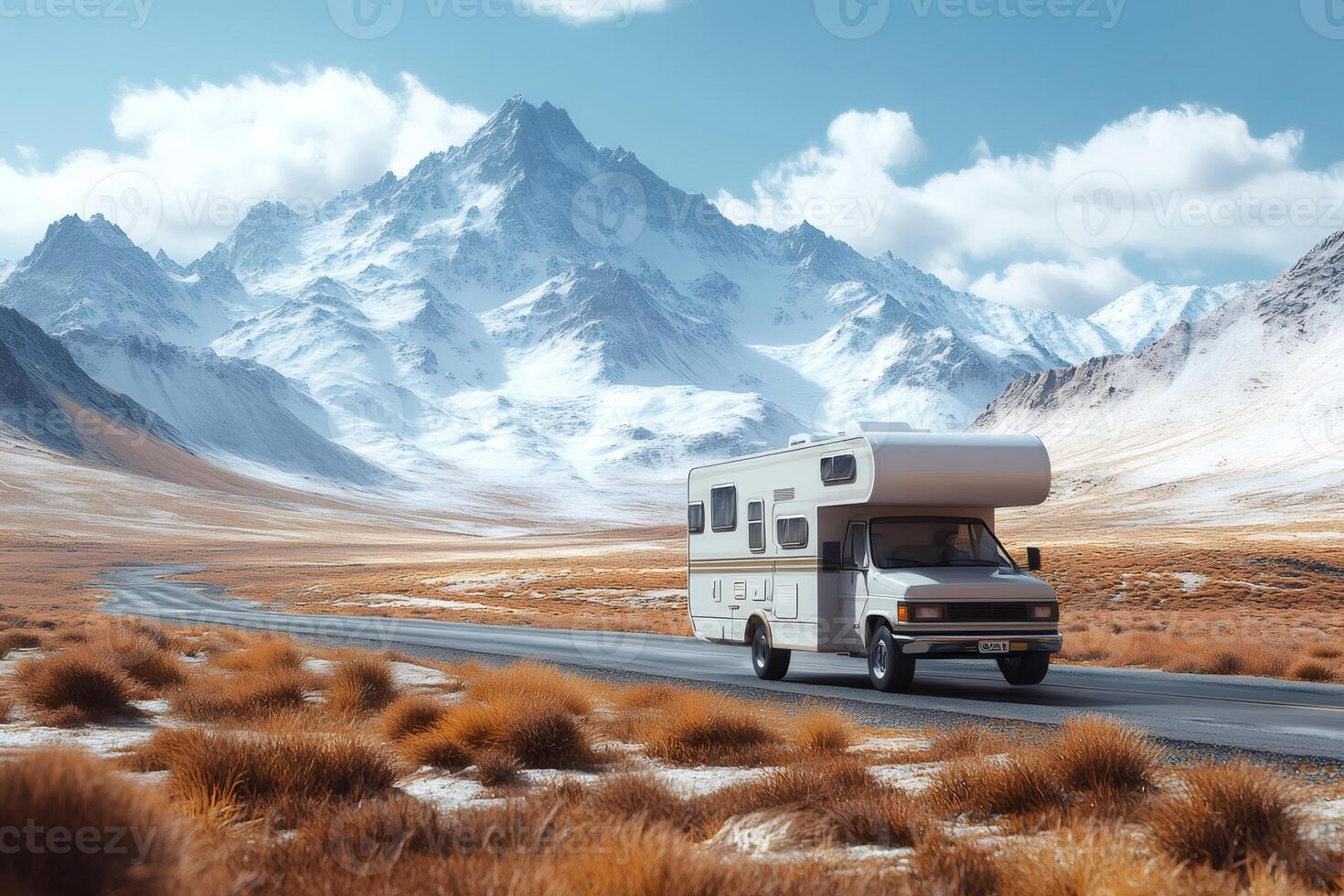 Campervan Journeying Through Snowy Mountain Landscape photo