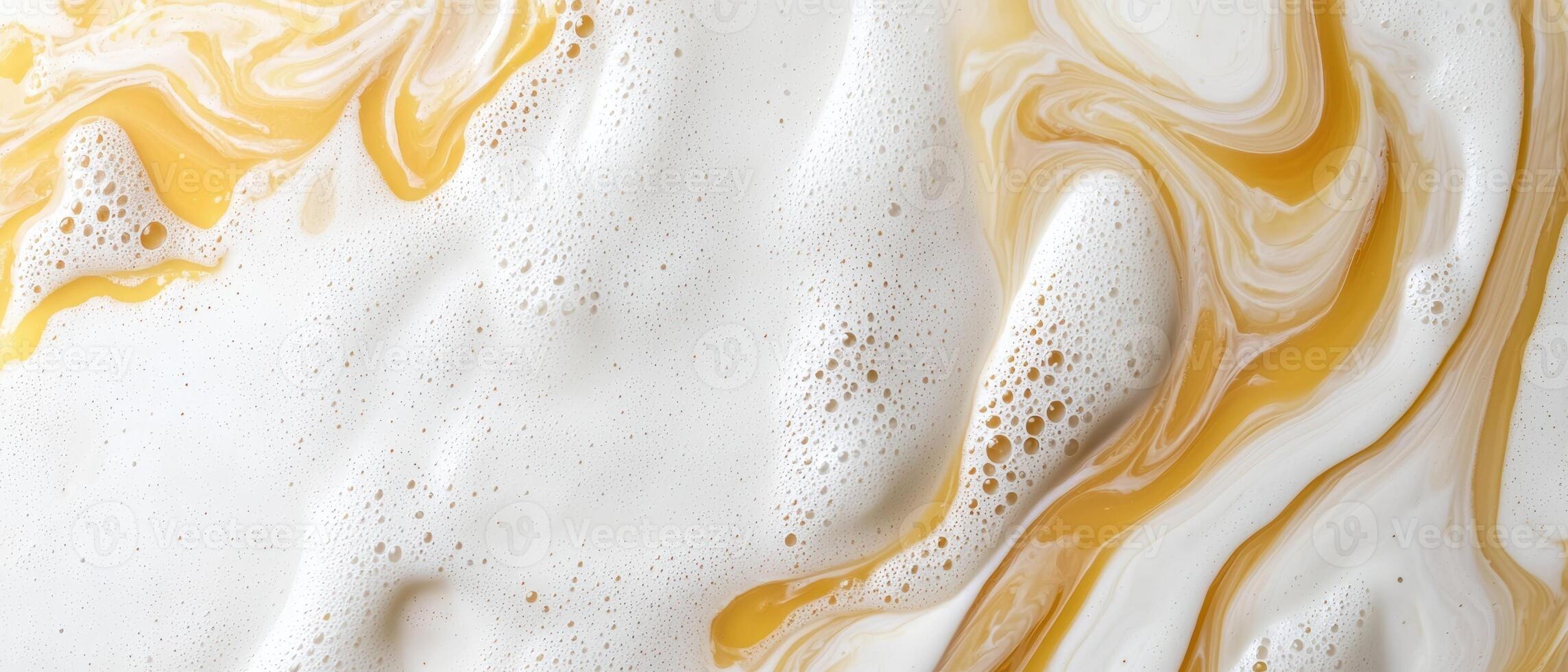 Swirls of honey and cream create a visually appealing texture photo