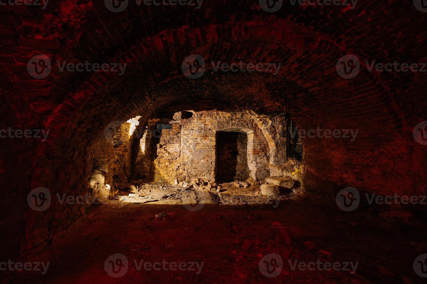 Dark and creepy vaulted red brick dungeon... photo