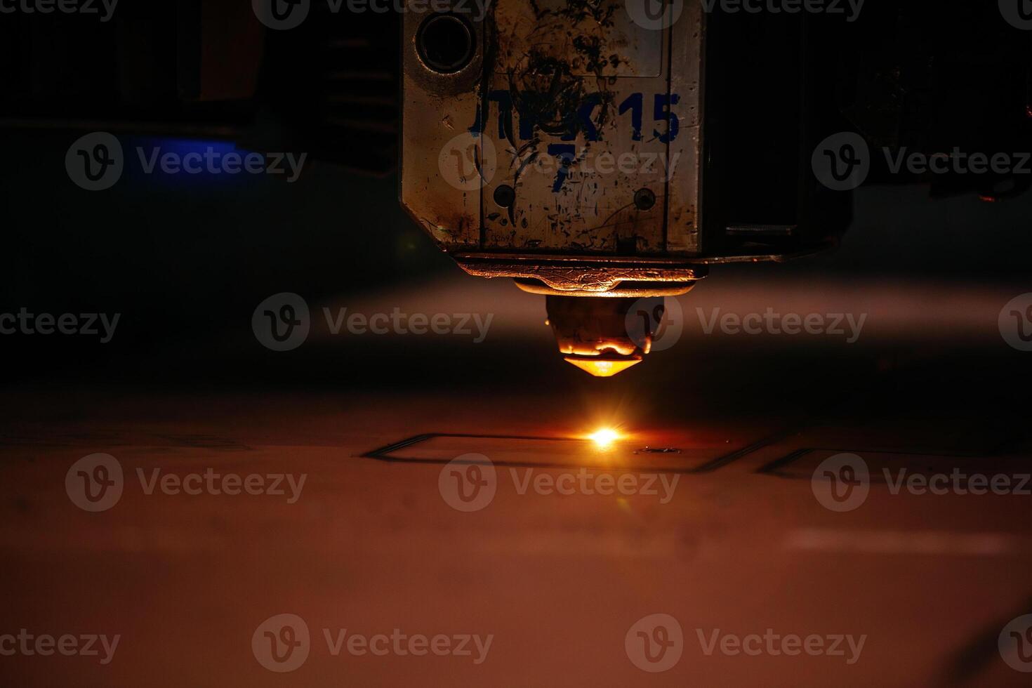 Working laser cutting machine, close up view photo
