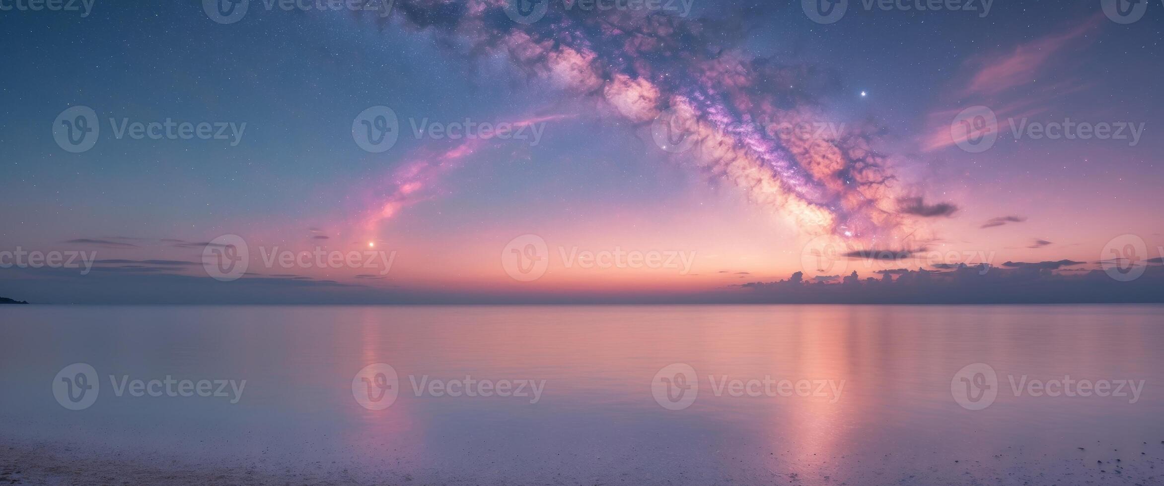 Milky Way reflects on tranquil beach sunset. photo