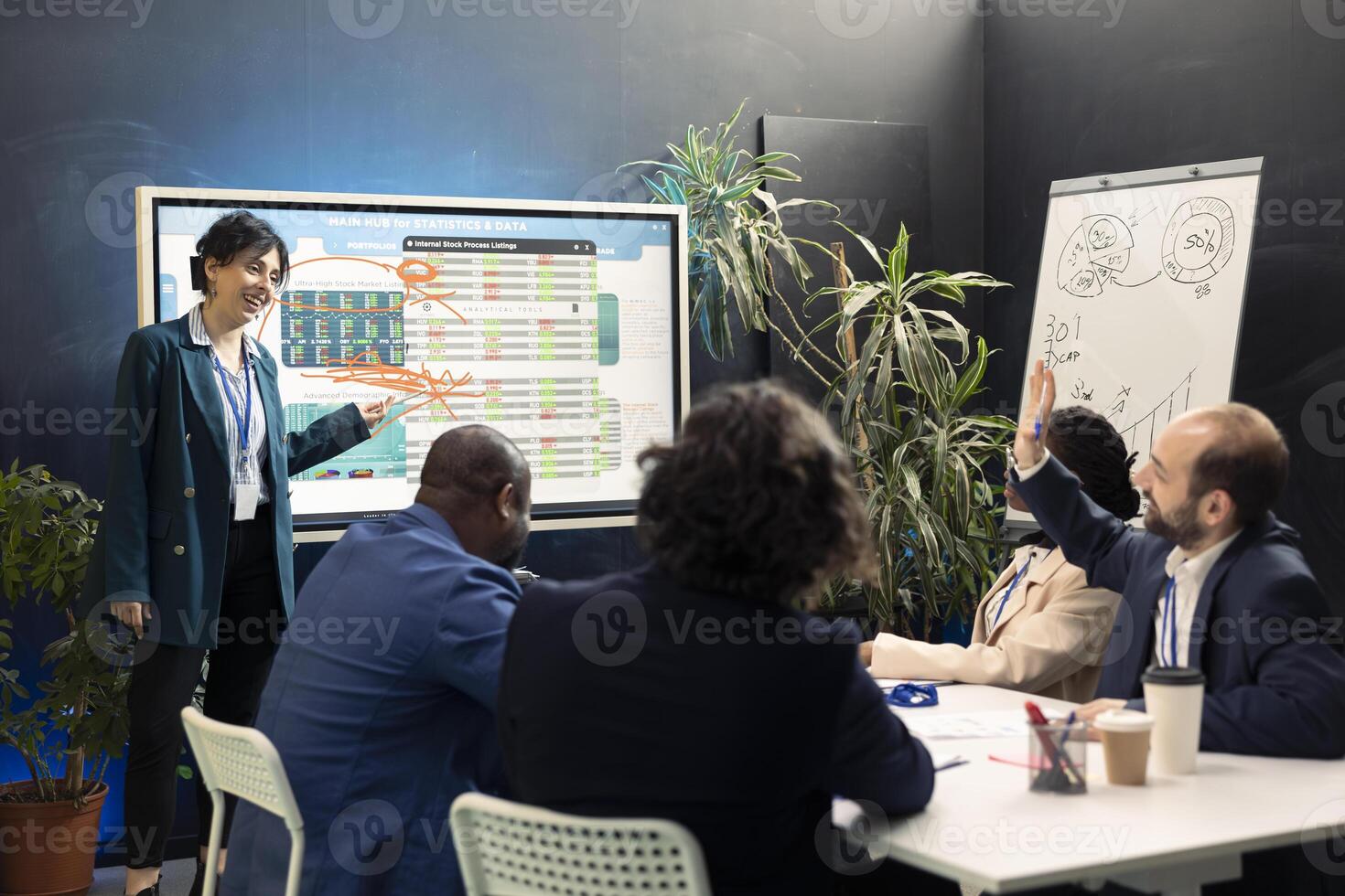 Team of company experts reviews feedback on sales and orders to work on future projects, developing marketing strategies in conference room. Startup enterprise managers in meeting. photo