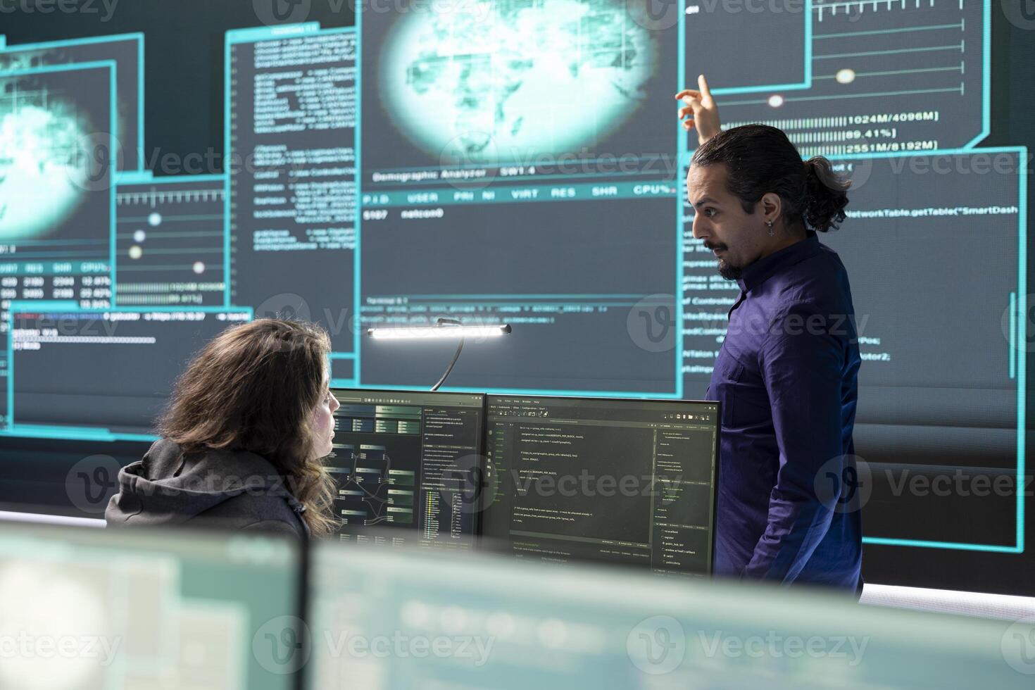 Cyber operations center with governmental hackers working on digital security activities during hybrid war. Specialists team ensuring security and malware detection, cyber surveillance. photo