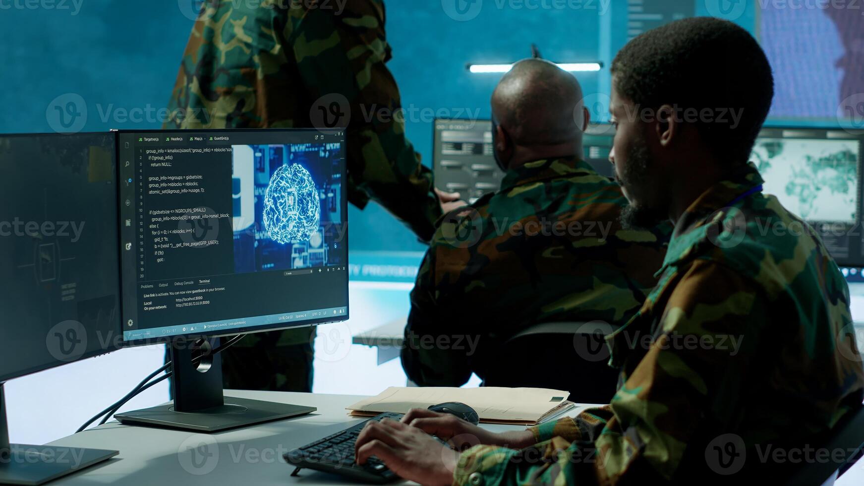 Programming engineer soldier handles AI brain and deep learning data on computer in command post, coordinates national defense operations. Neural network artificial intelligence science. Camera A. photo