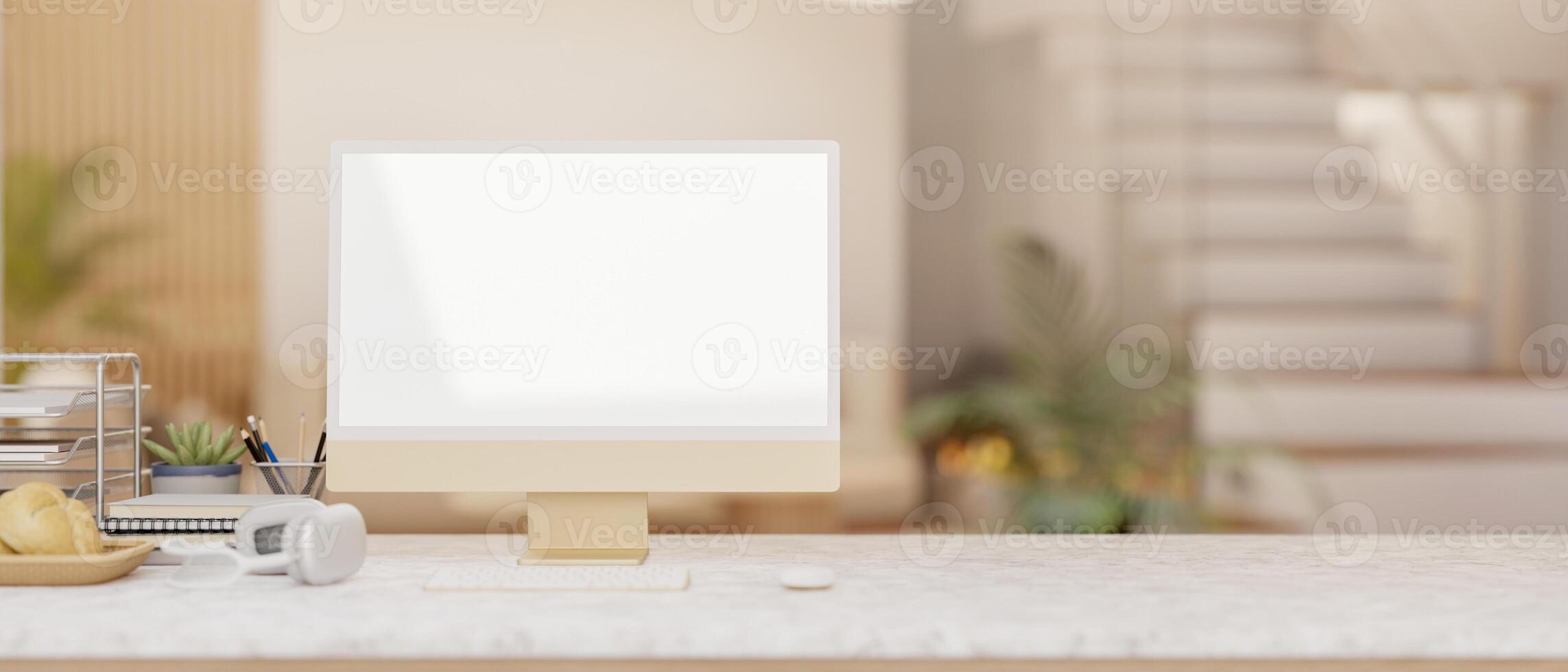A computer with a blank screen mockup on a desk set in a contemporary living room. photo