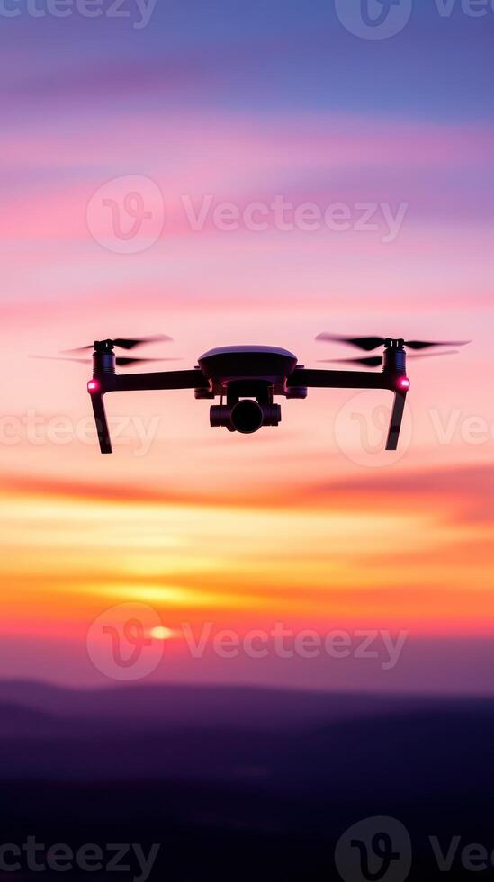 modern drone hovering in mid air against colorful sunset sky photo