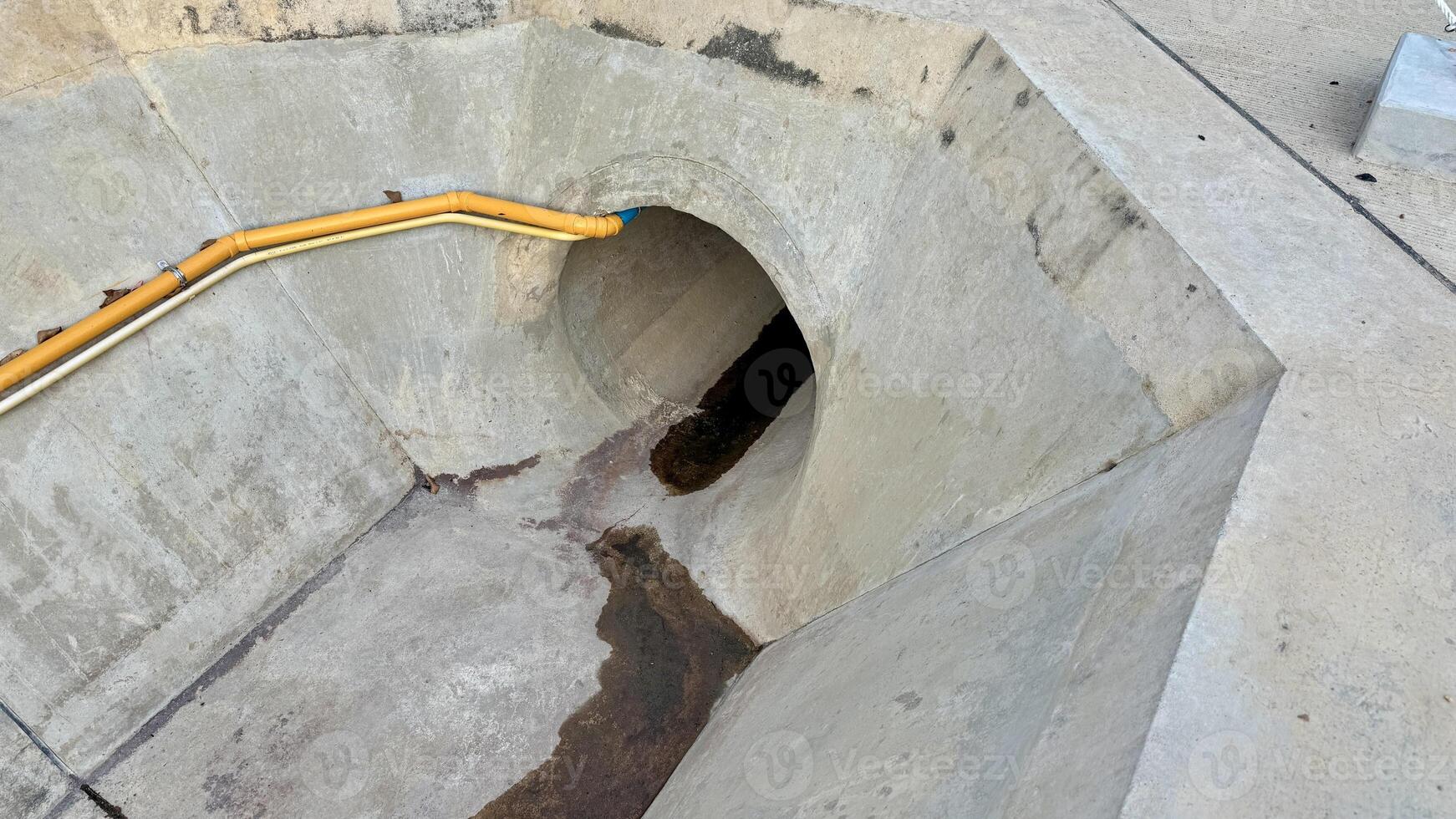 Concrete Drainage Tunnel A high-angle view of a newly constructed concrete drainage tunnel, showcasing its robust design and efficient water management capabilities. photo
